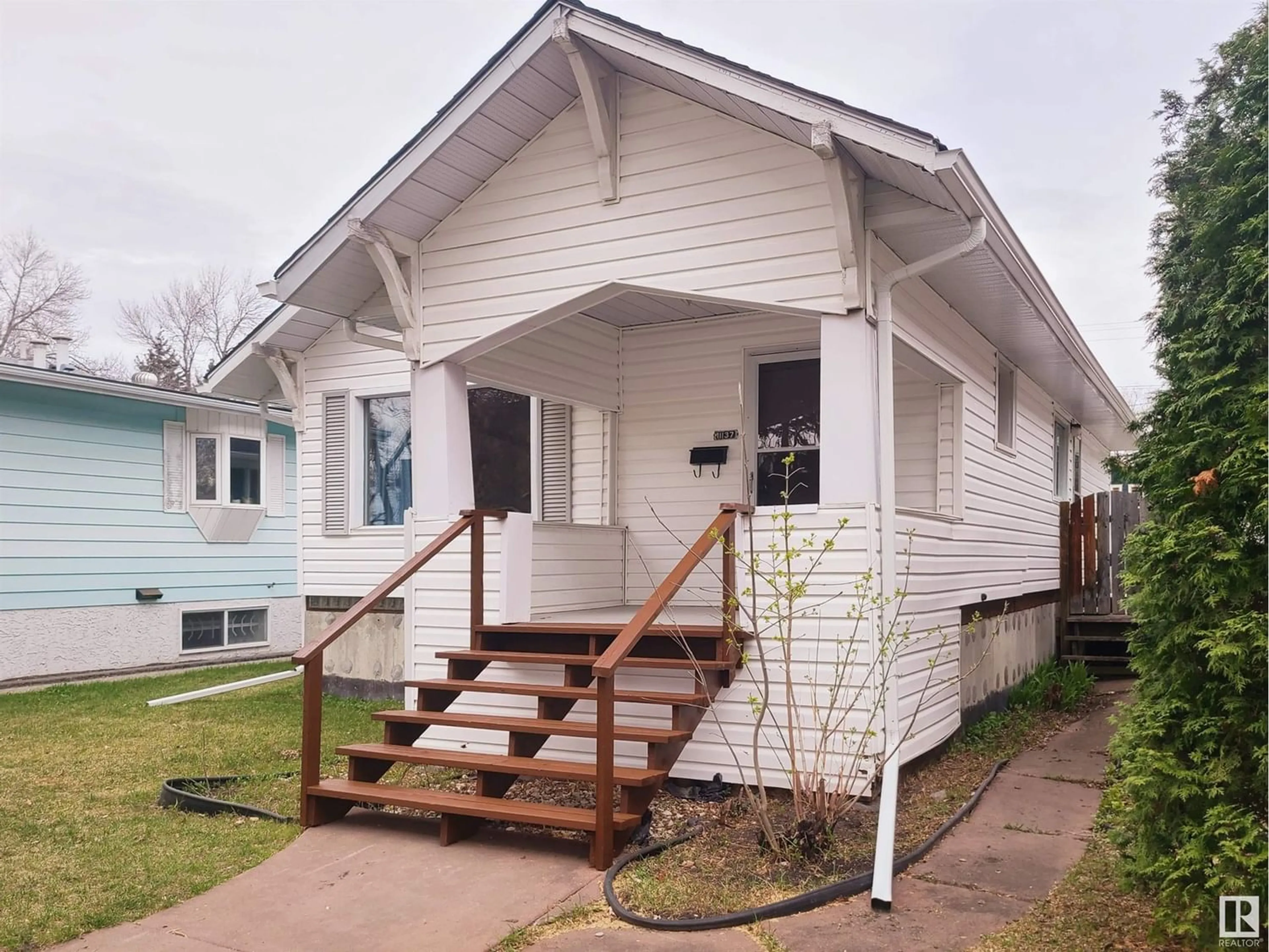 Frontside or backside of a home for 11137 123 ST NW, Edmonton Alberta T5M0E6