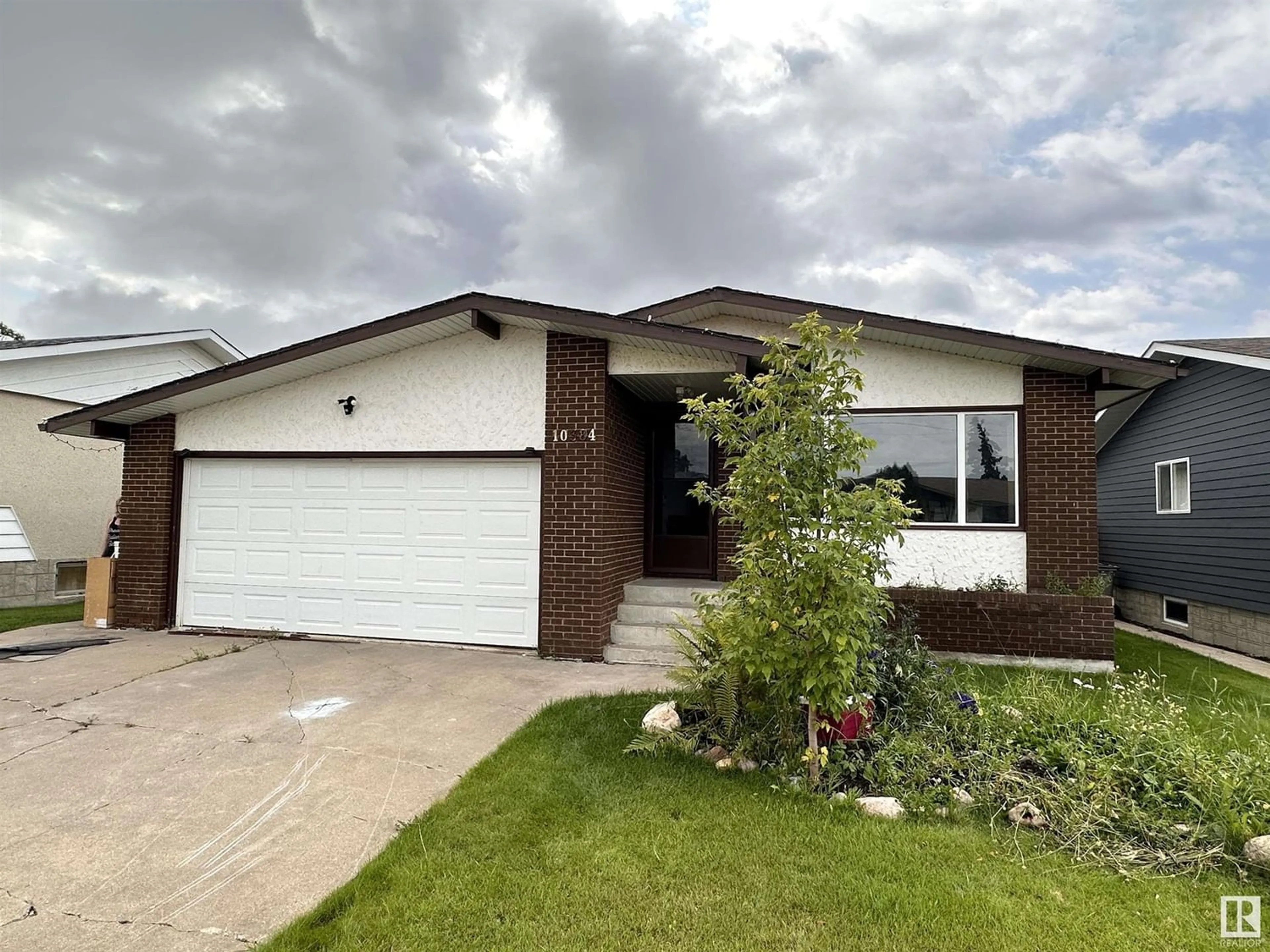 Frontside or backside of a home for 10384 107 A Ave., Westlock Alberta T7P1J5