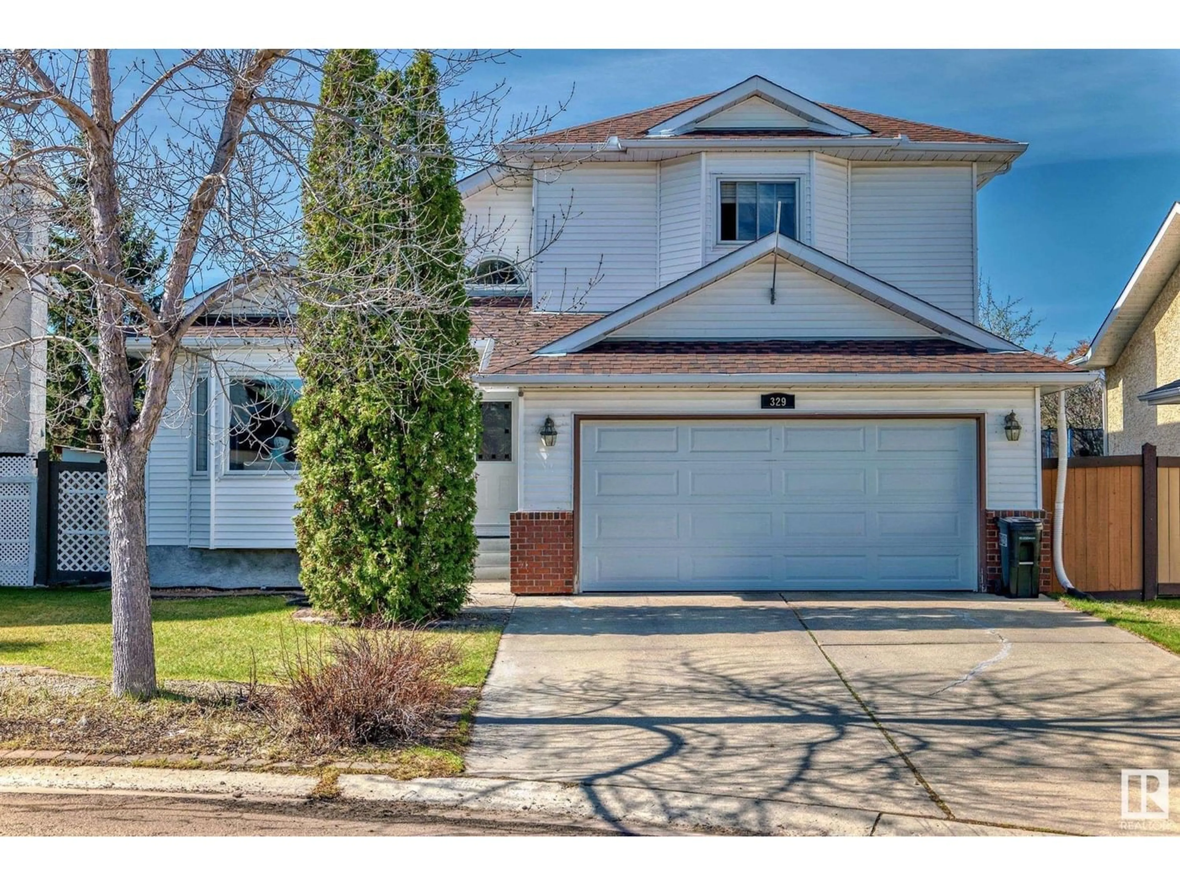 Frontside or backside of a home for 329 BUCHANAN WY NW, Edmonton Alberta T6R2B4