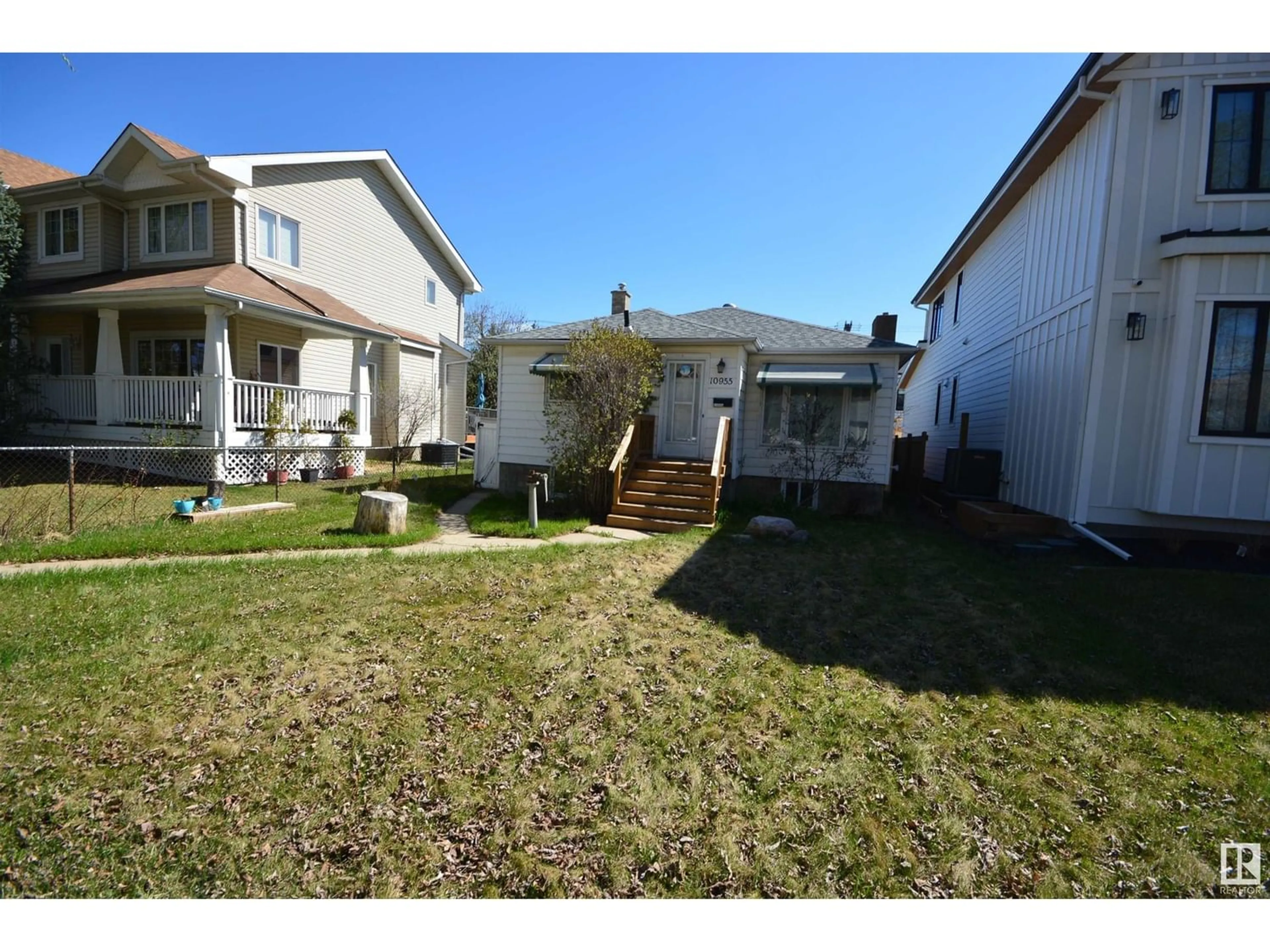Frontside or backside of a home for 10955 130 ST NW, Edmonton Alberta T5M0Z6