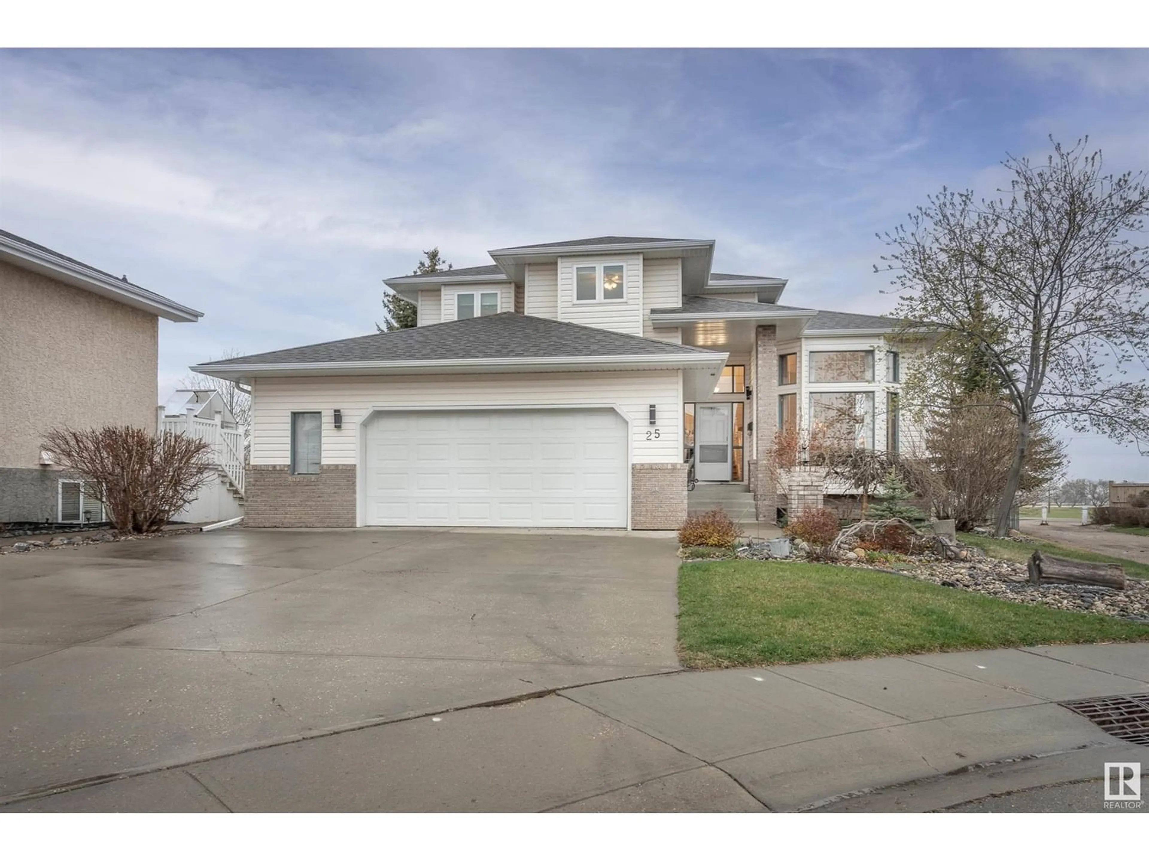 Frontside or backside of a home for 25 RIVARD CR, Beaumont Alberta T4X1L6