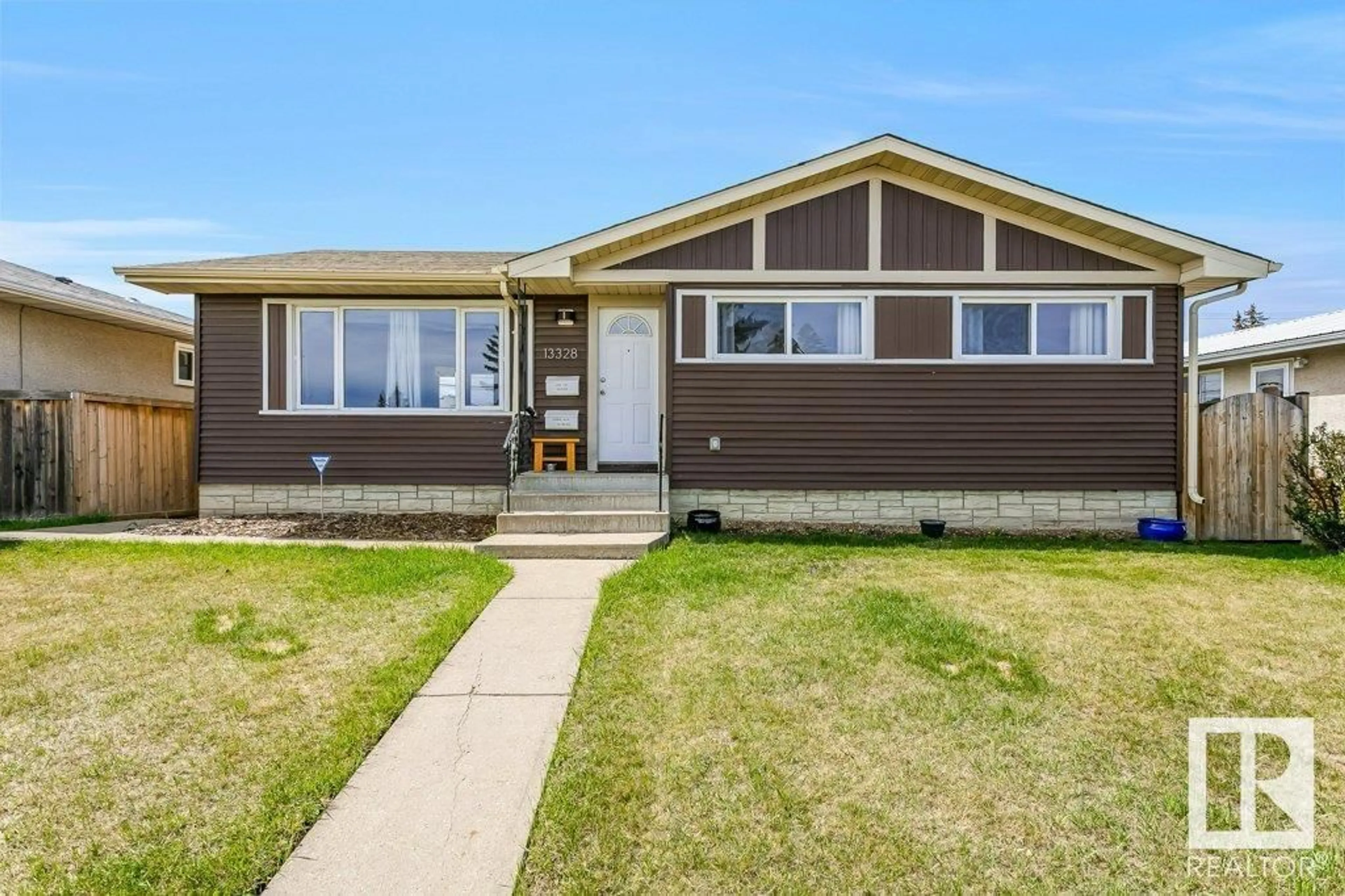 Frontside or backside of a home for 13328 81 ST NW, Edmonton Alberta T5C1N7