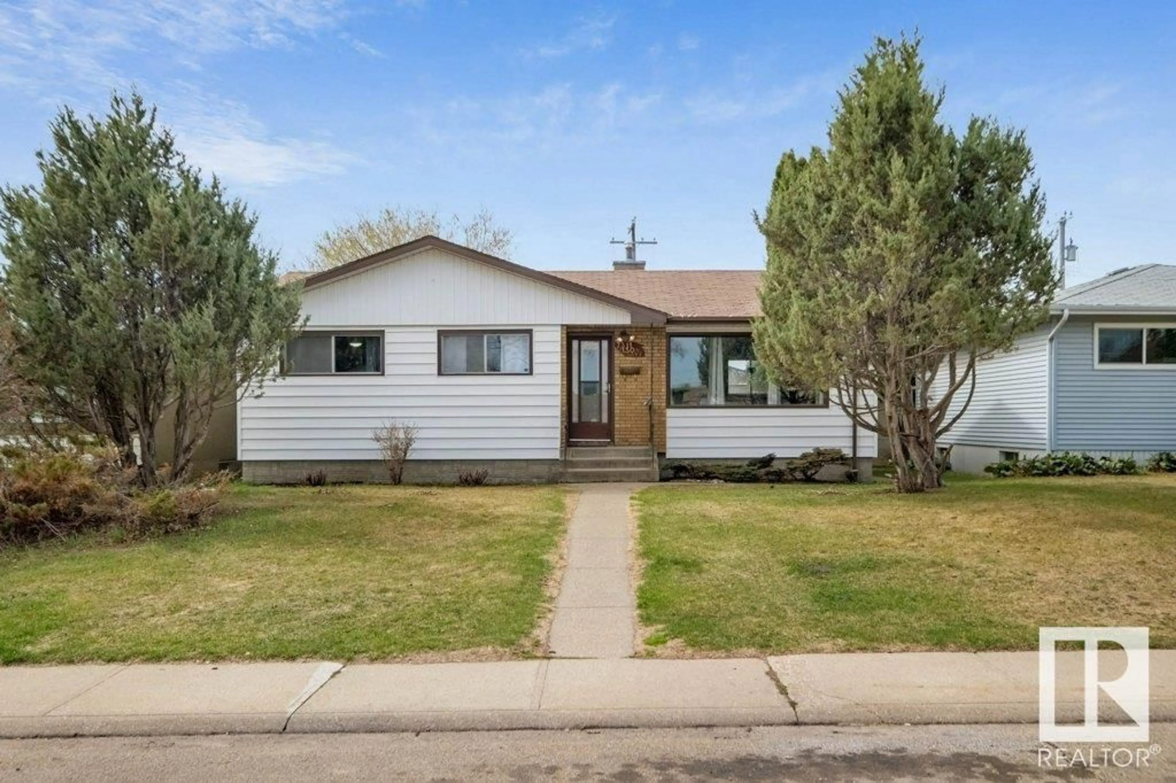 Frontside or backside of a home for 7311 130A AV NW, Edmonton Alberta T5C1Z1