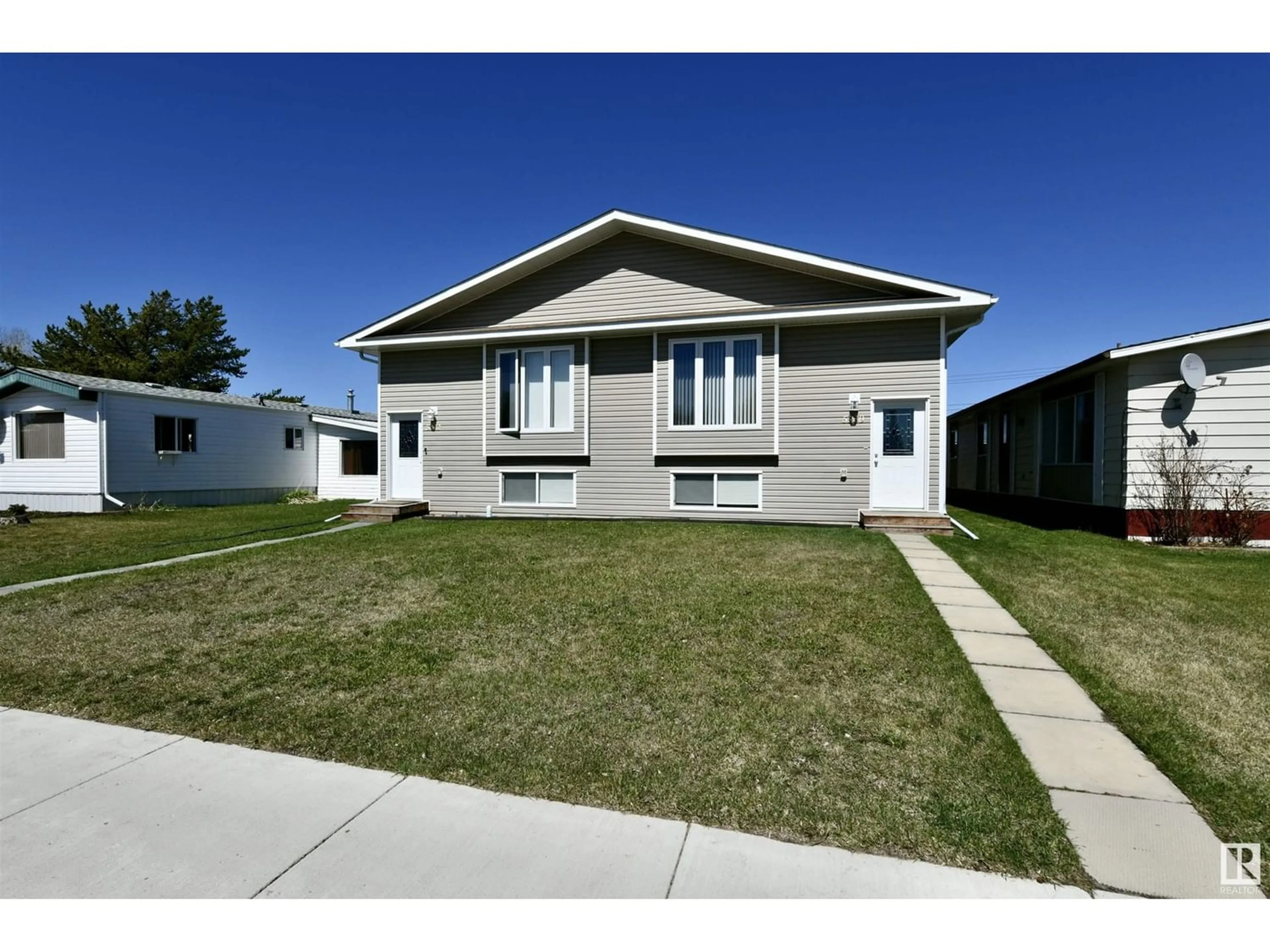 Frontside or backside of a home for 5230 55 AV, St. Paul Town Alberta T0A3A1