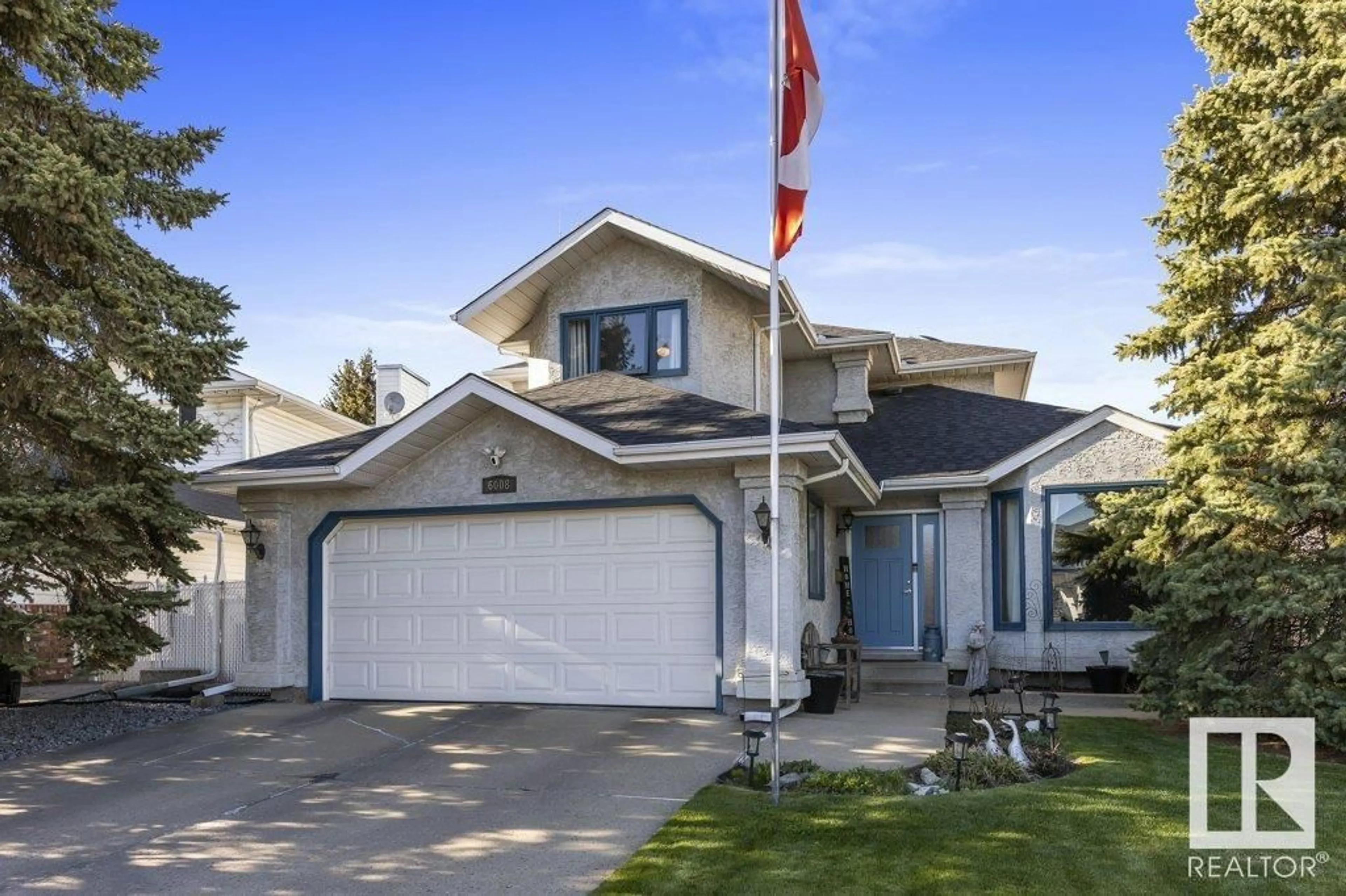 Frontside or backside of a home for 6008 156 AV NW, Edmonton Alberta T5Y2M8