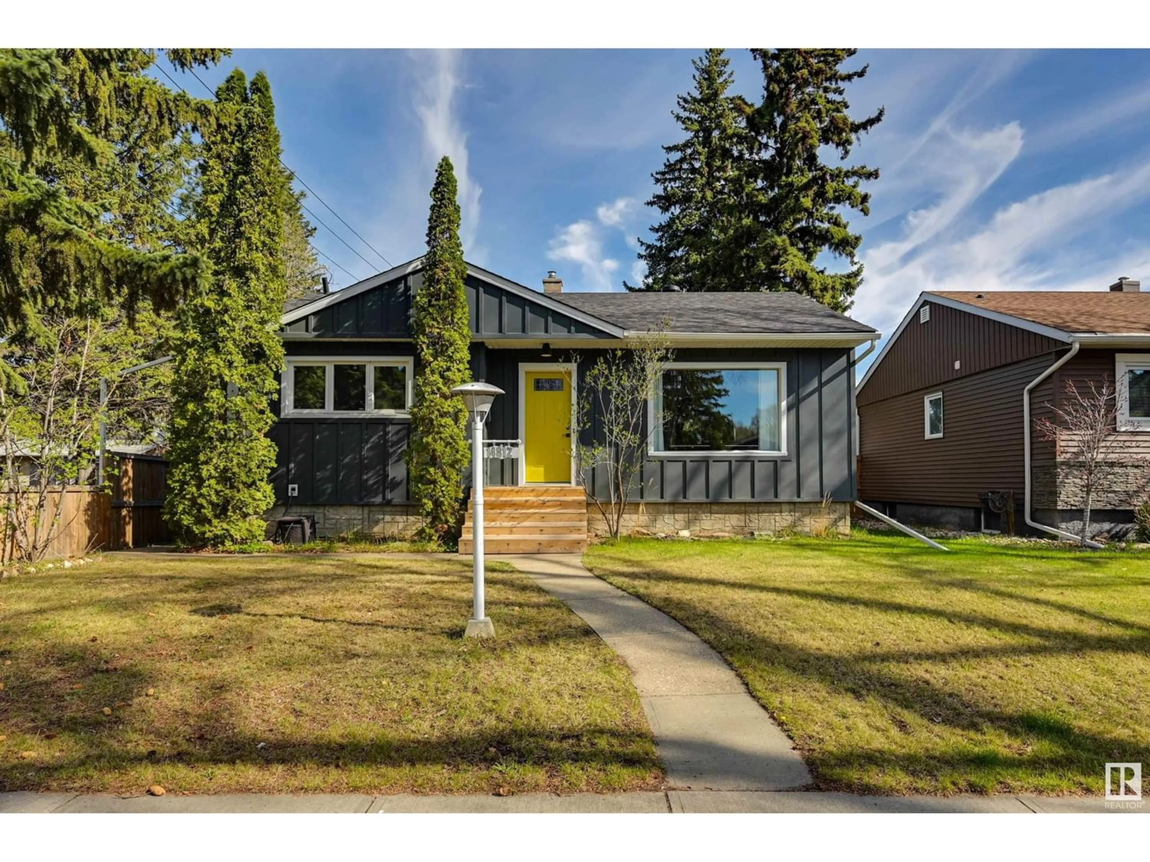 Frontside or backside of a home for 14812 93 AV NW, Edmonton Alberta T5R5G9