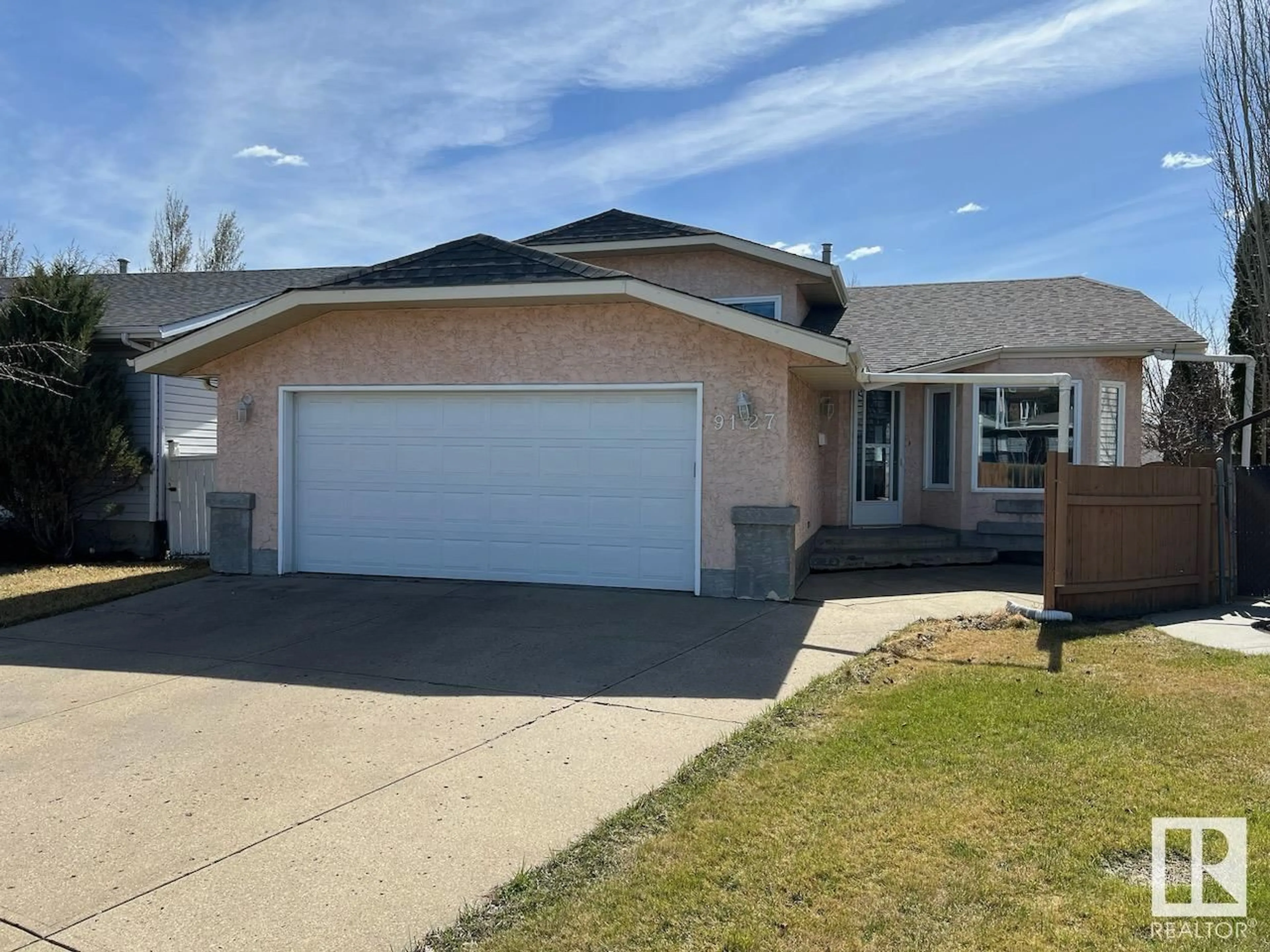Frontside or backside of a home for 9127 180A AV NW, Edmonton Alberta T5Z2K5