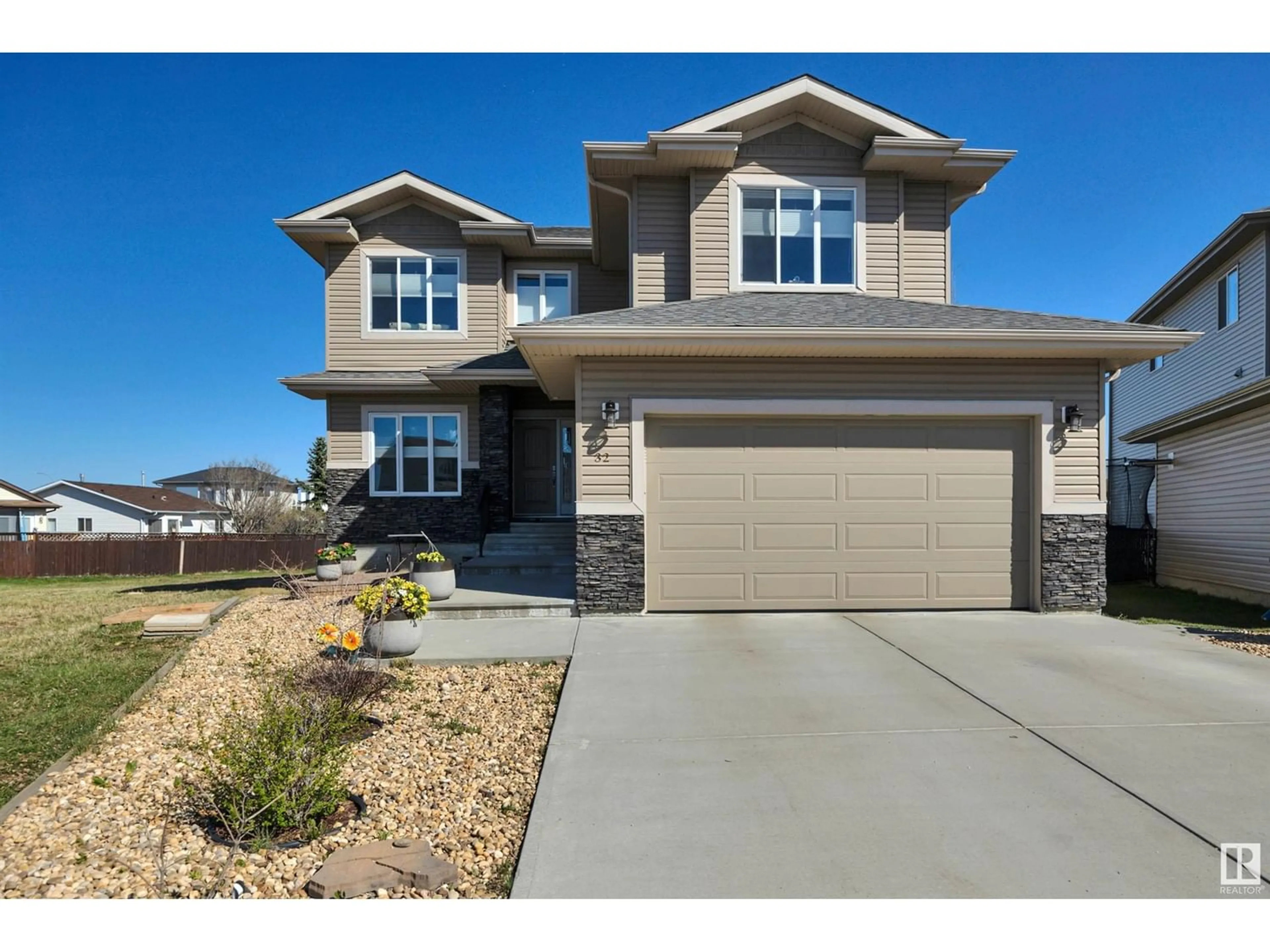 Frontside or backside of a home for 32 MCKENZIE CL, Leduc Alberta T9E0P2