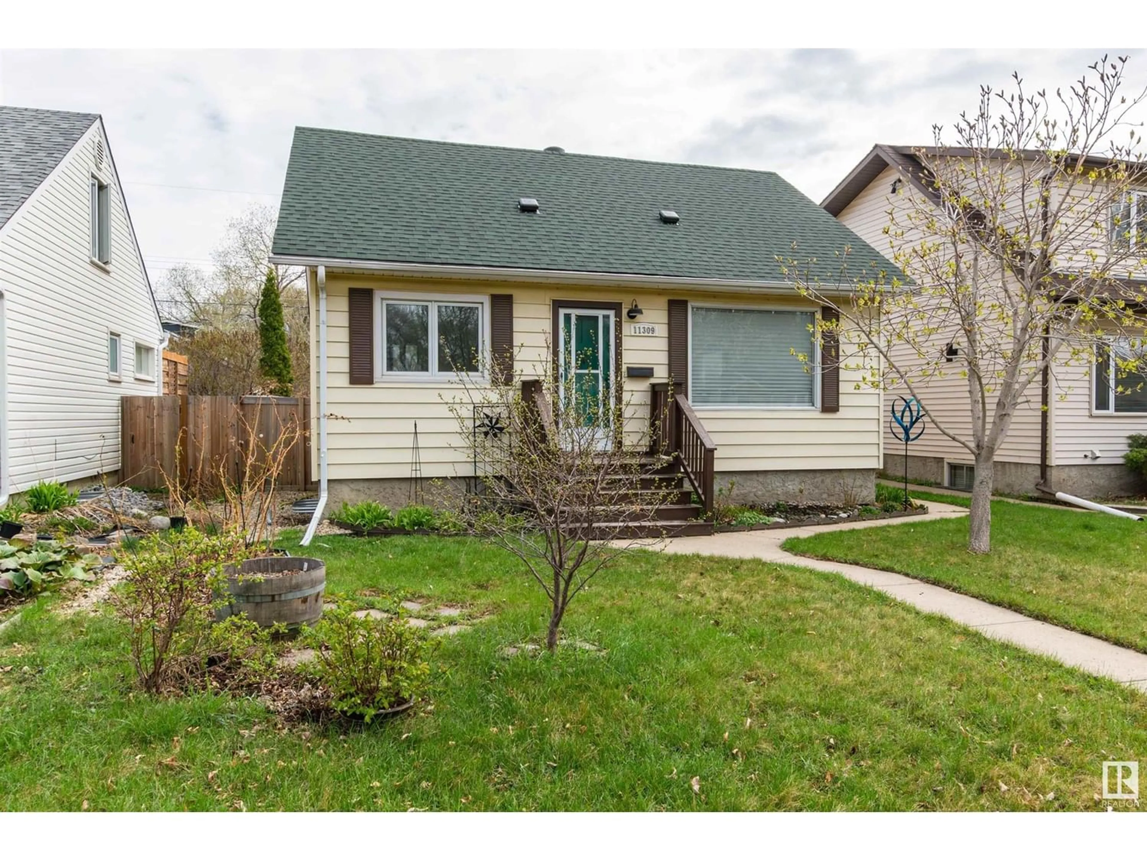Frontside or backside of a home for 11309 69 ST NW, Edmonton Alberta T5B1R8