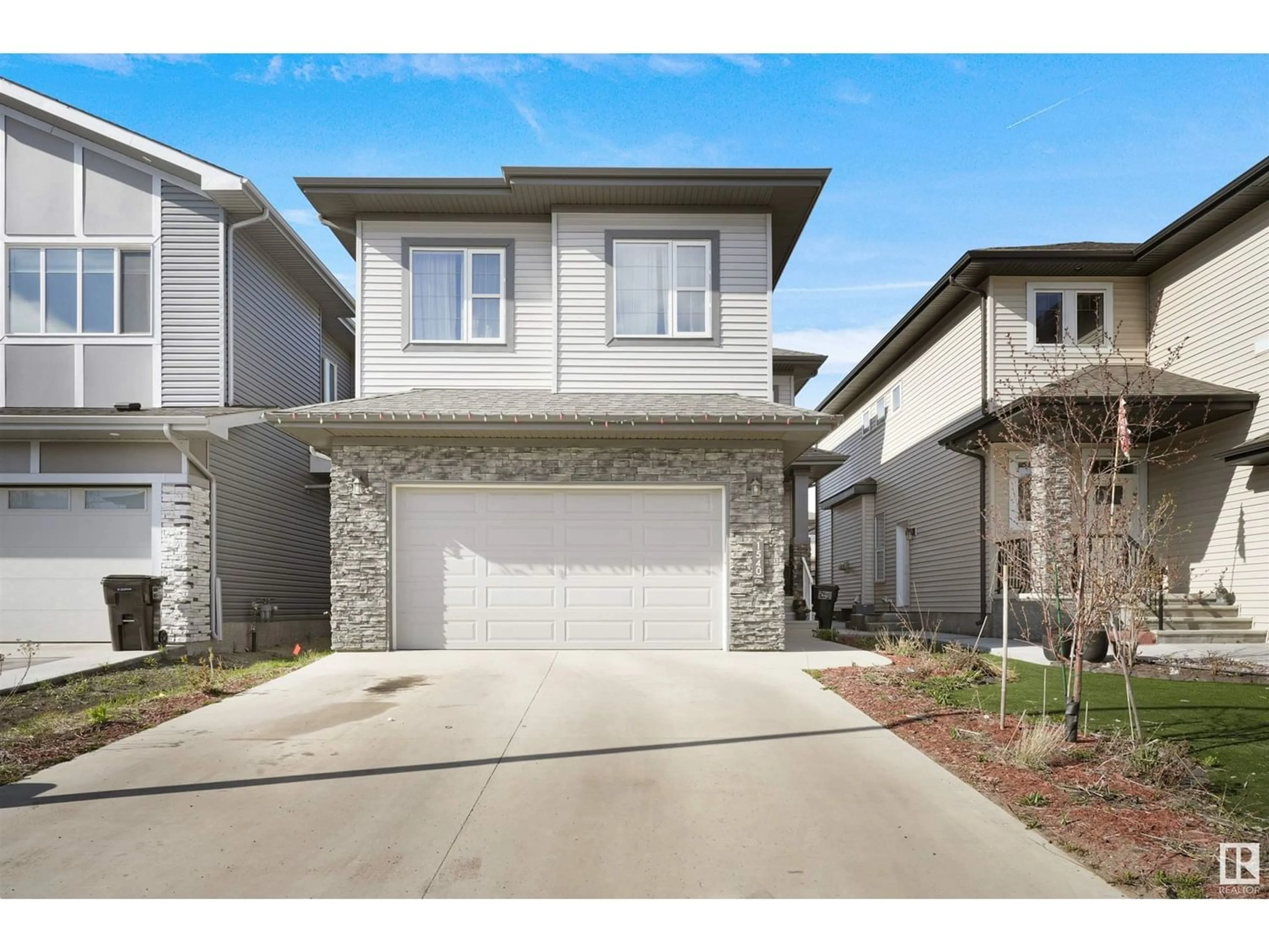 Frontside or backside of a home for 1540 151 AV NW, Edmonton Alberta T5Y3T4