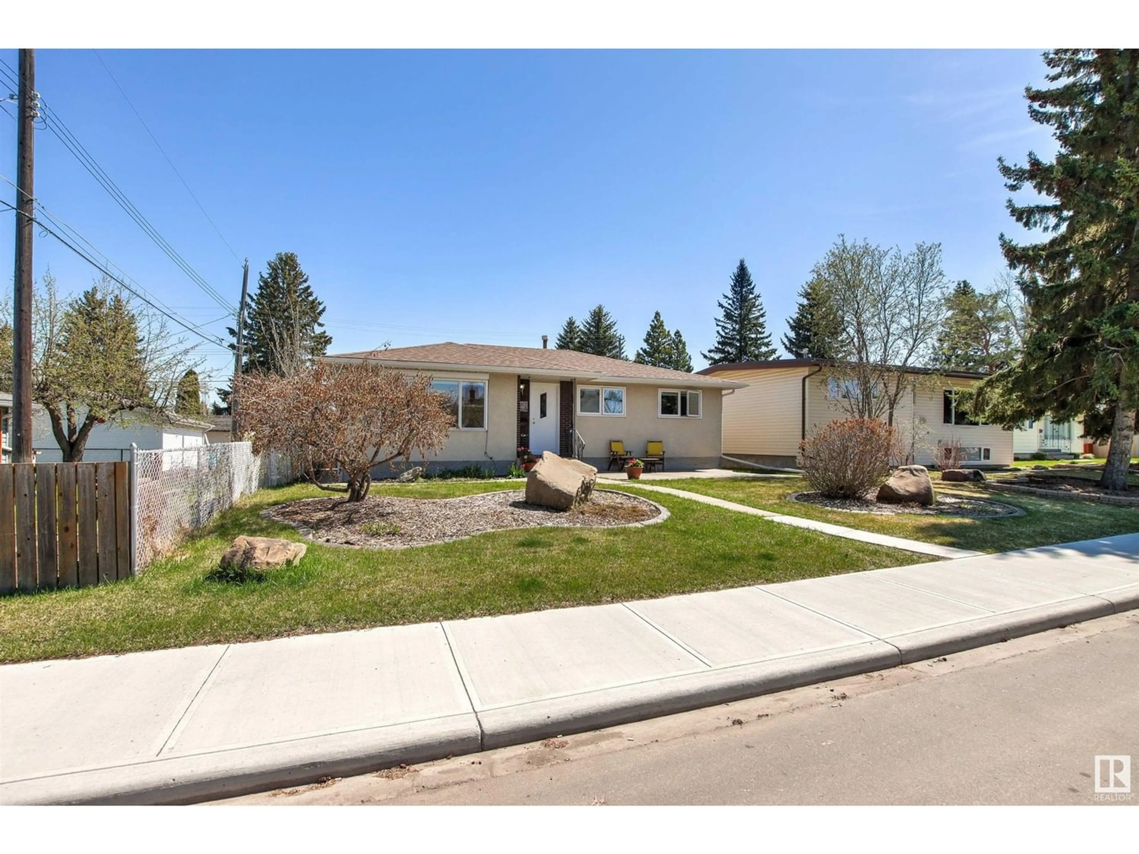 Frontside or backside of a home for 4911 116A ST NW, Edmonton Alberta T6H3R5