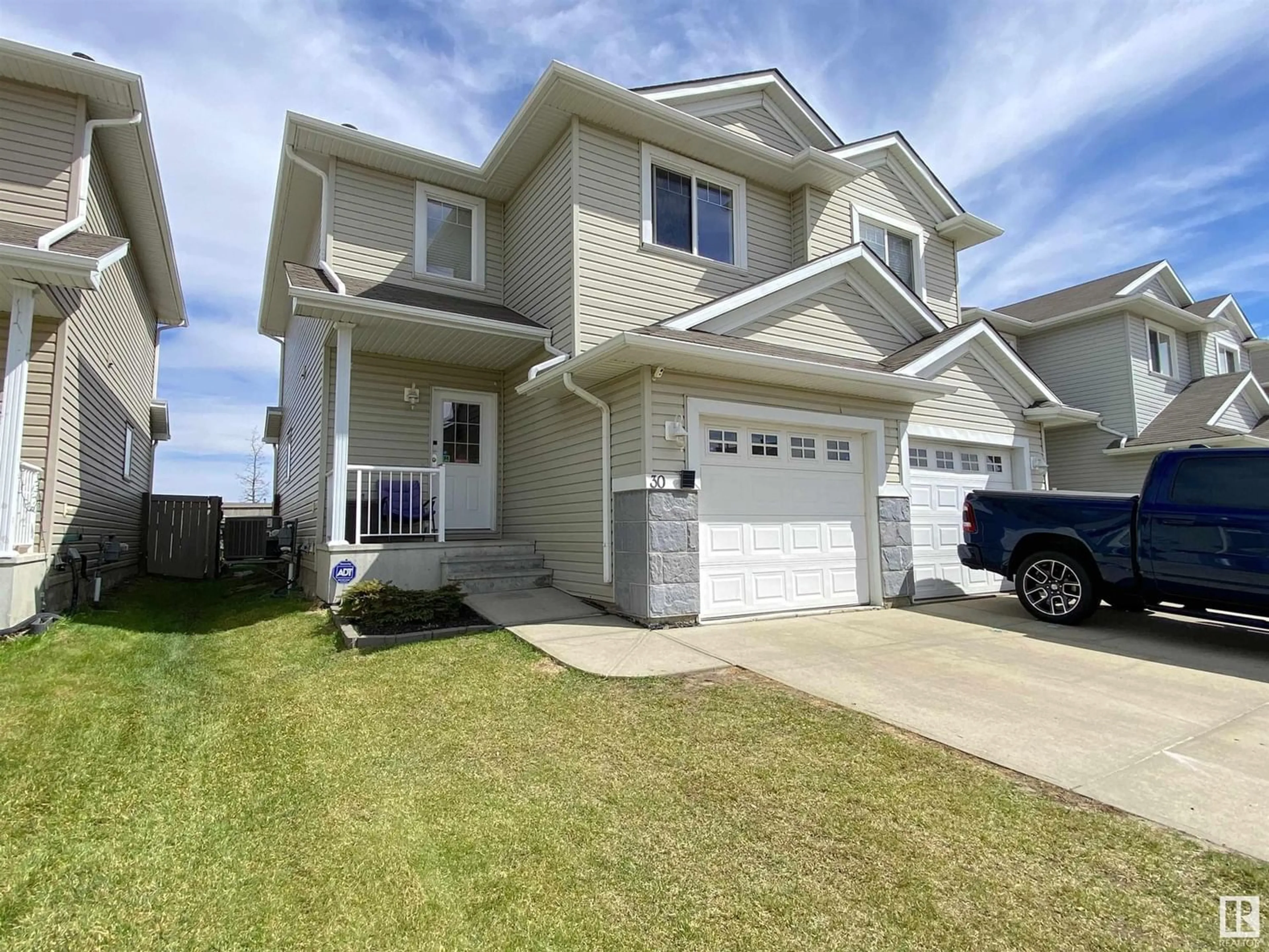 Frontside or backside of a home for #30 2503 24 ST NW, Edmonton Alberta T6T0B5