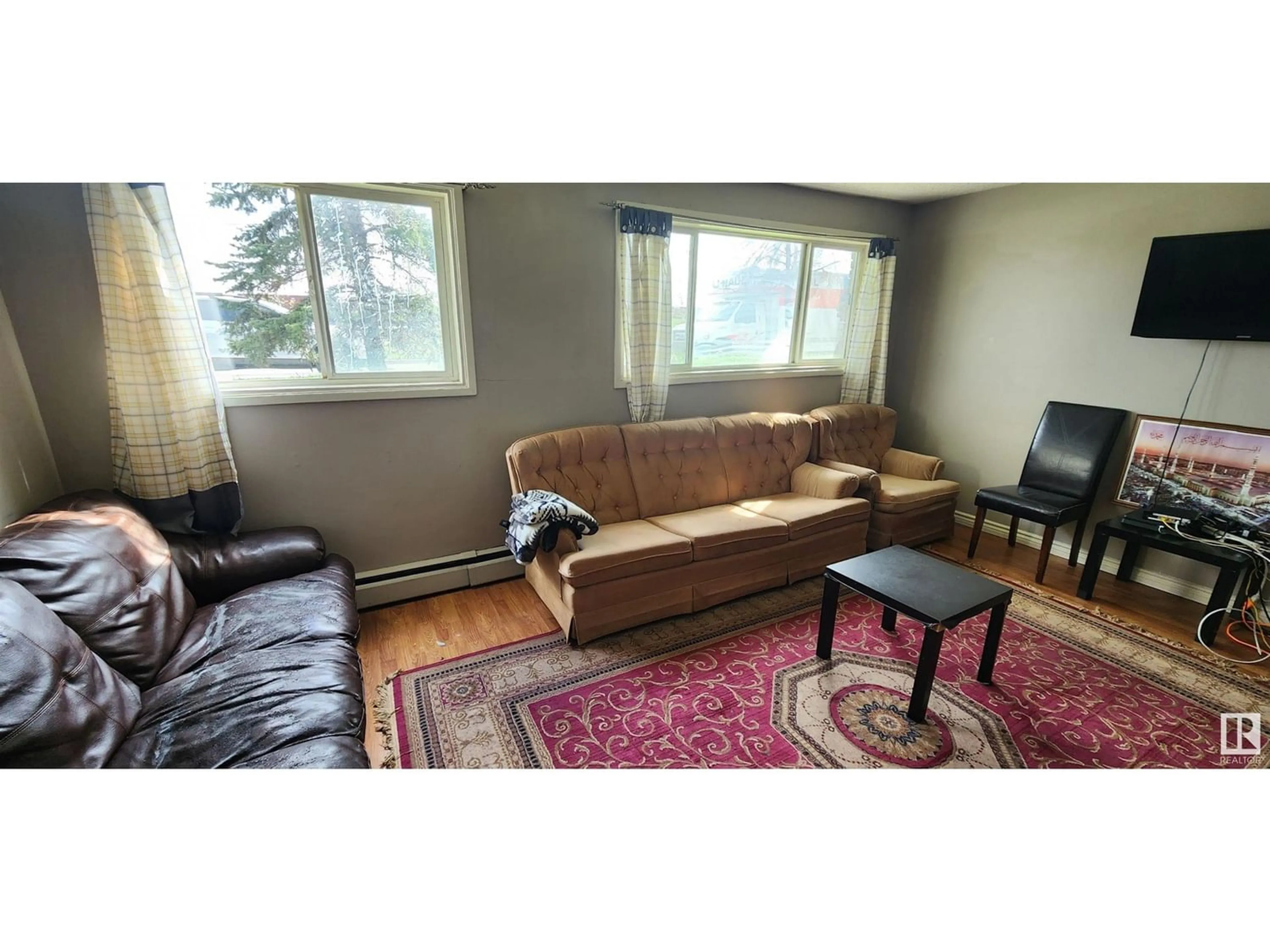 Living room for #104 11308 127 AV NW, Edmonton Alberta T5E0C5