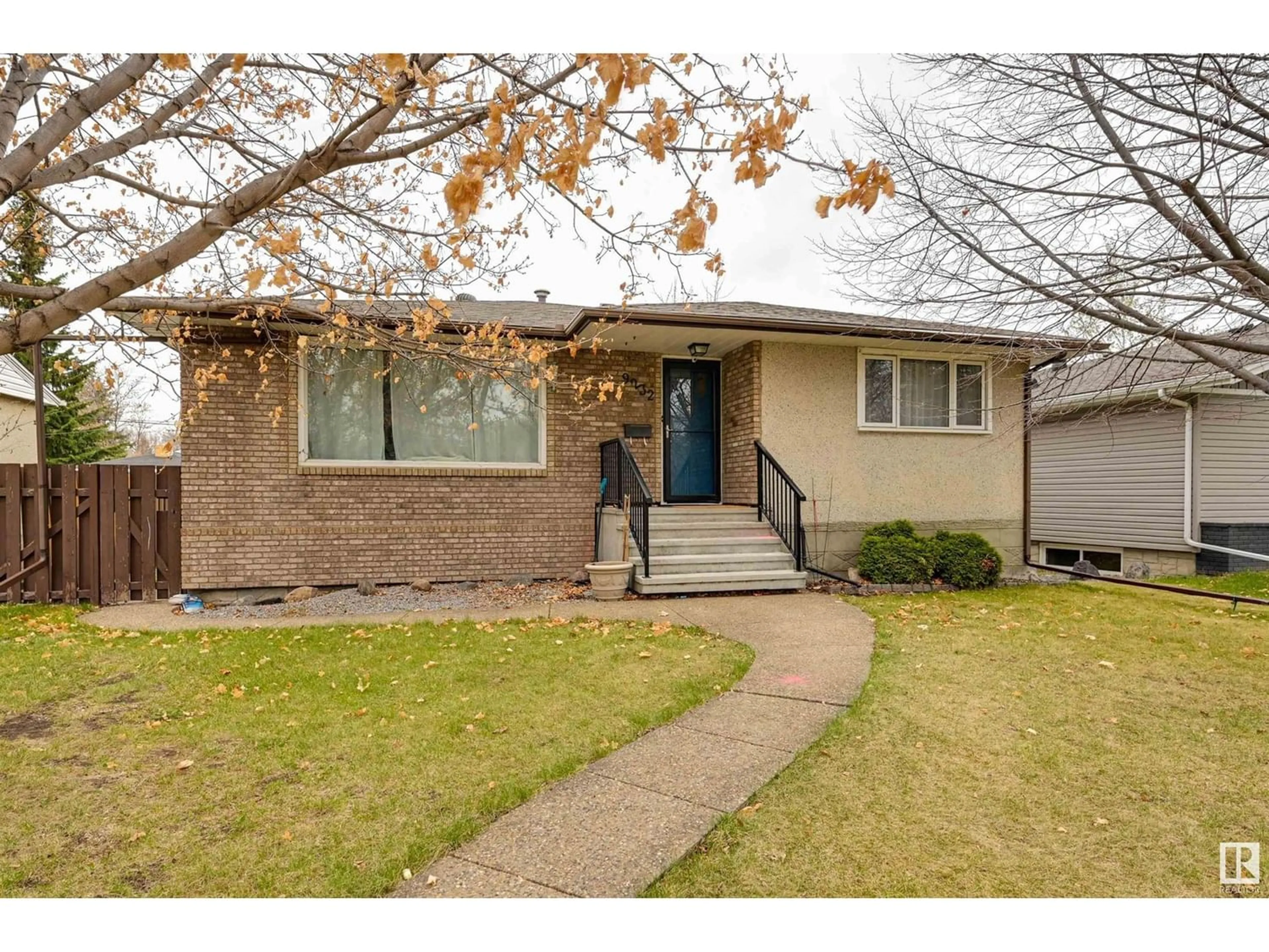 Frontside or backside of a home for 9232 79 ST NW, Edmonton Alberta T6C2R5