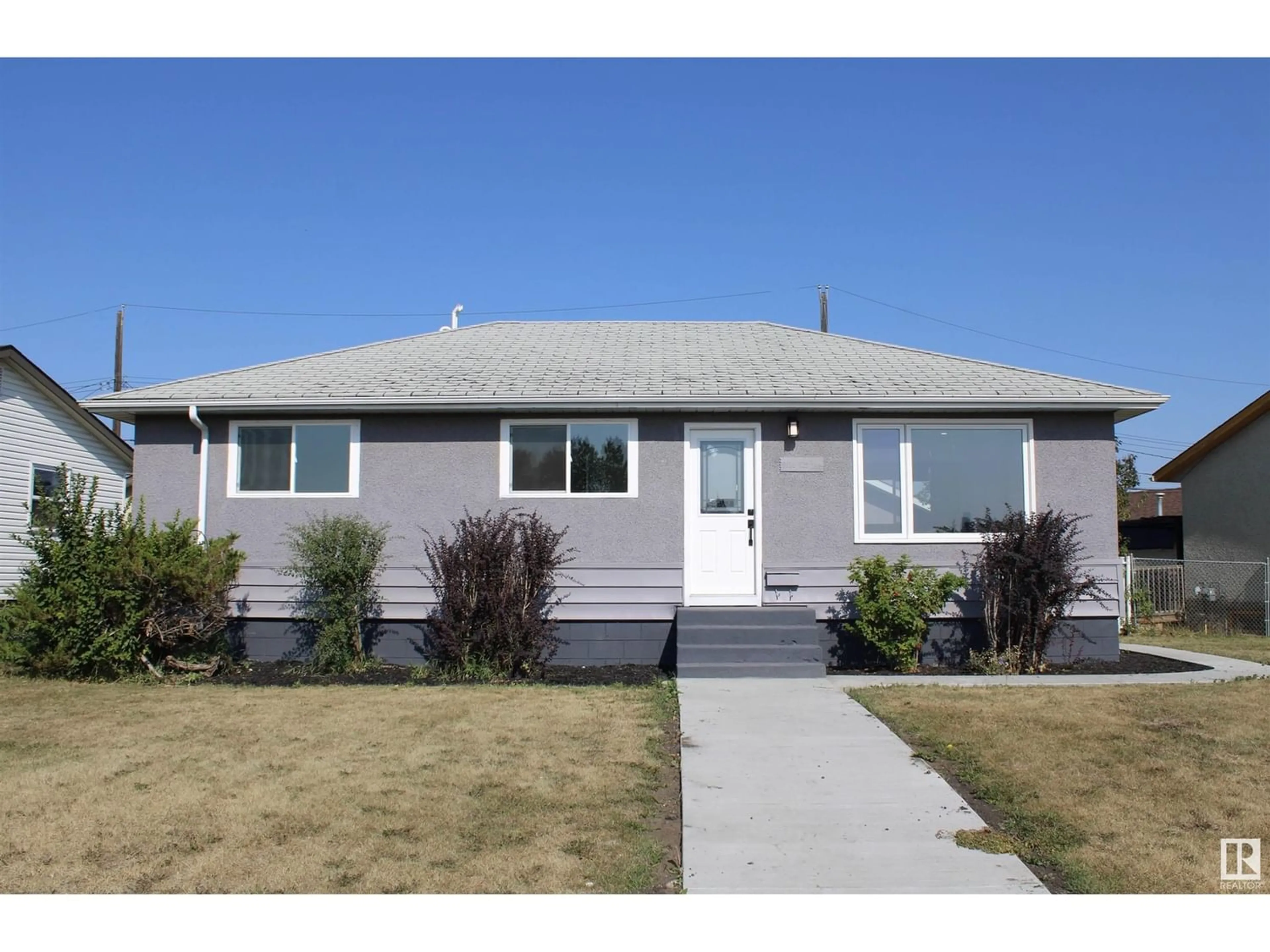 Frontside or backside of a home for 9116 129b AV NW, Edmonton Alberta T5E0P5