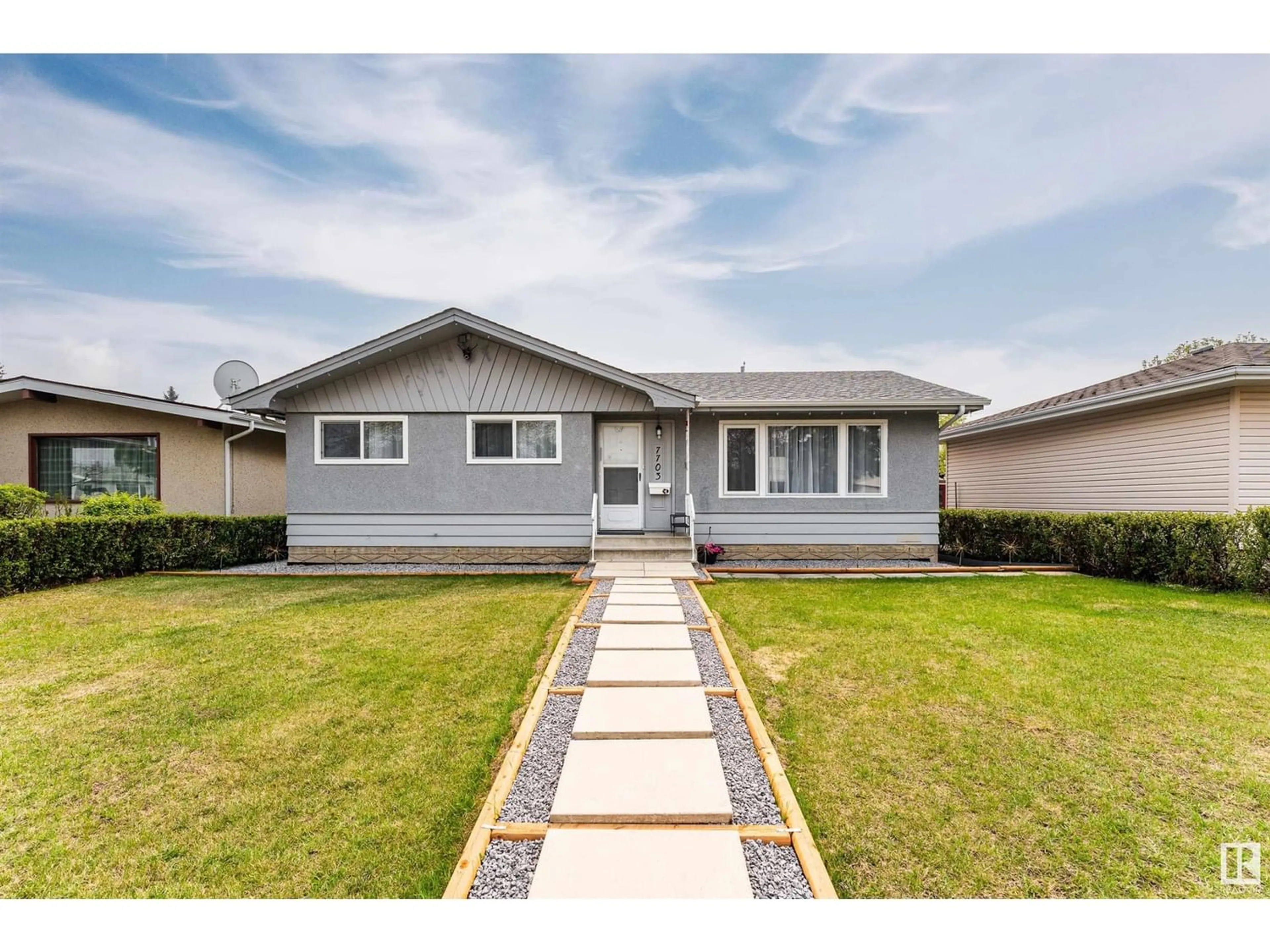 Frontside or backside of a home for 7703 132A AV NW, Edmonton Alberta T5C2C4