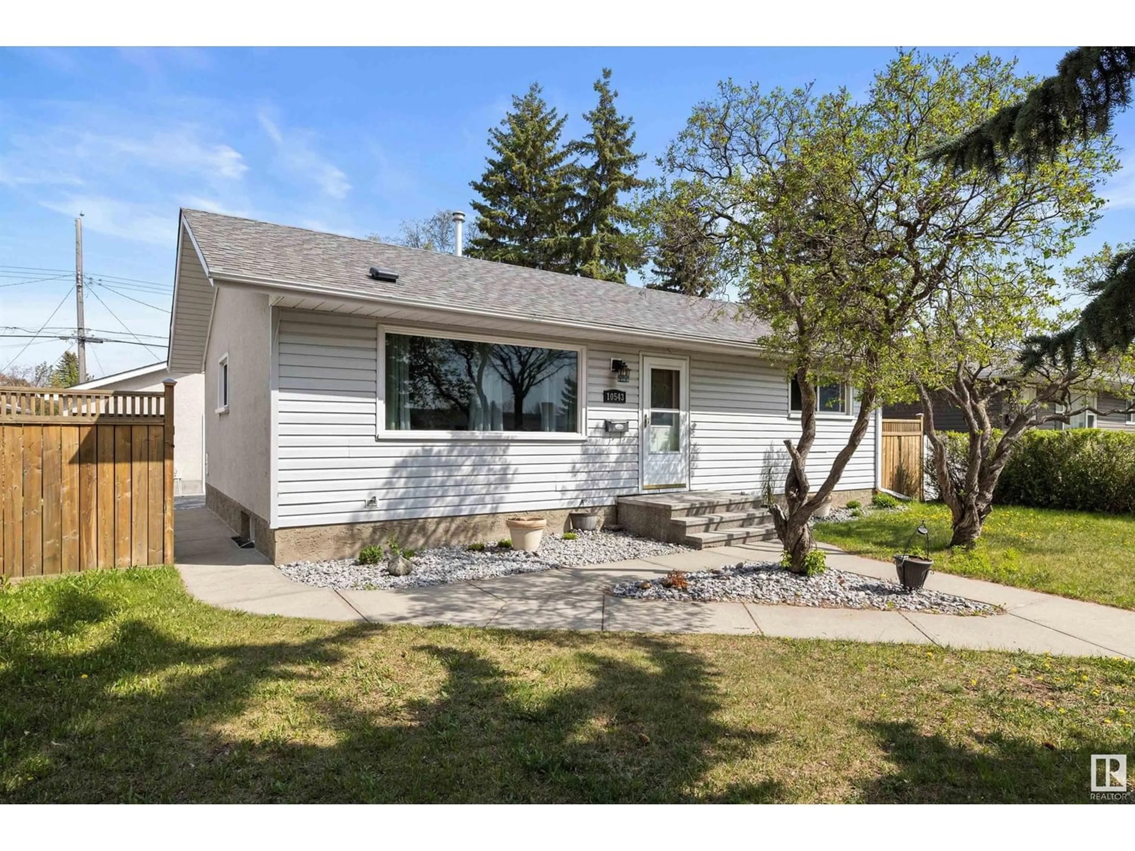 Frontside or backside of a home for 10543 46 ST NW, Edmonton Alberta T6A1Y4