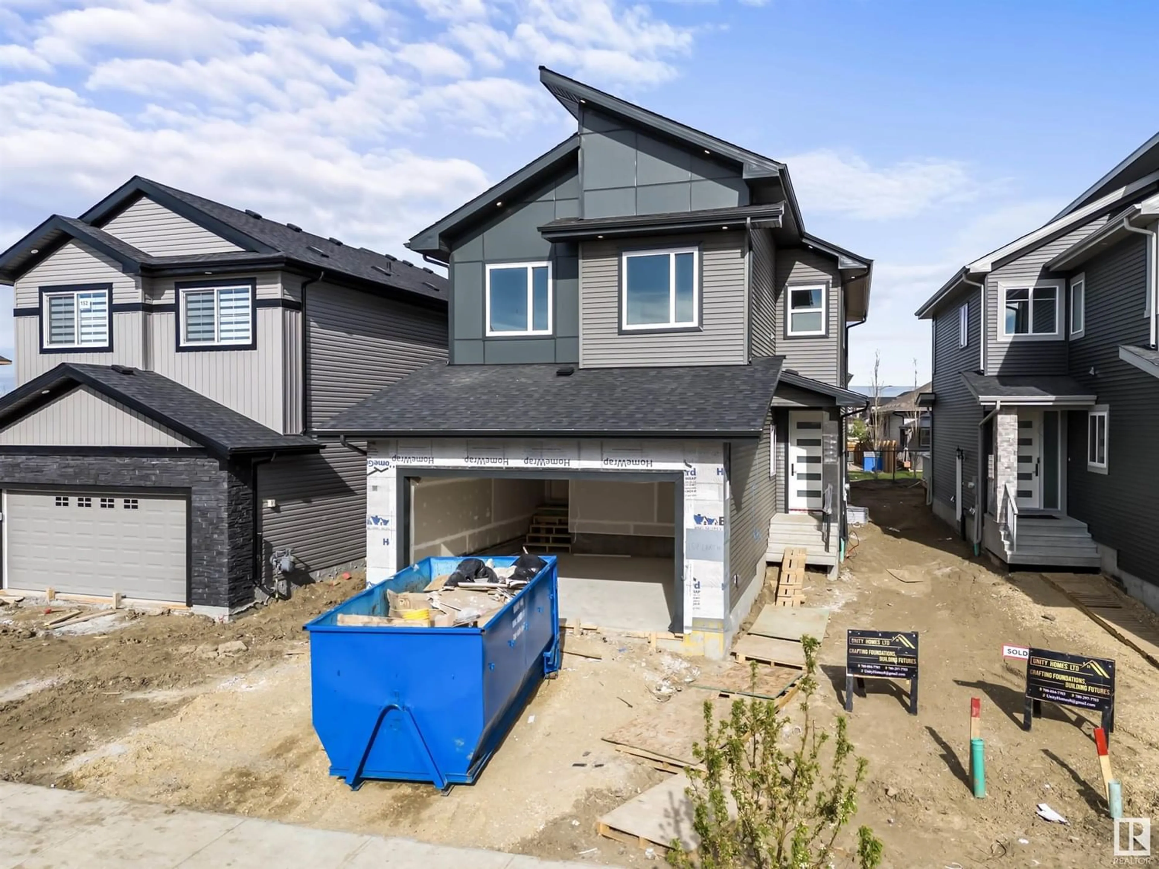 Frontside or backside of a home for 154 LARCH CR, Leduc Alberta T9E1N2
