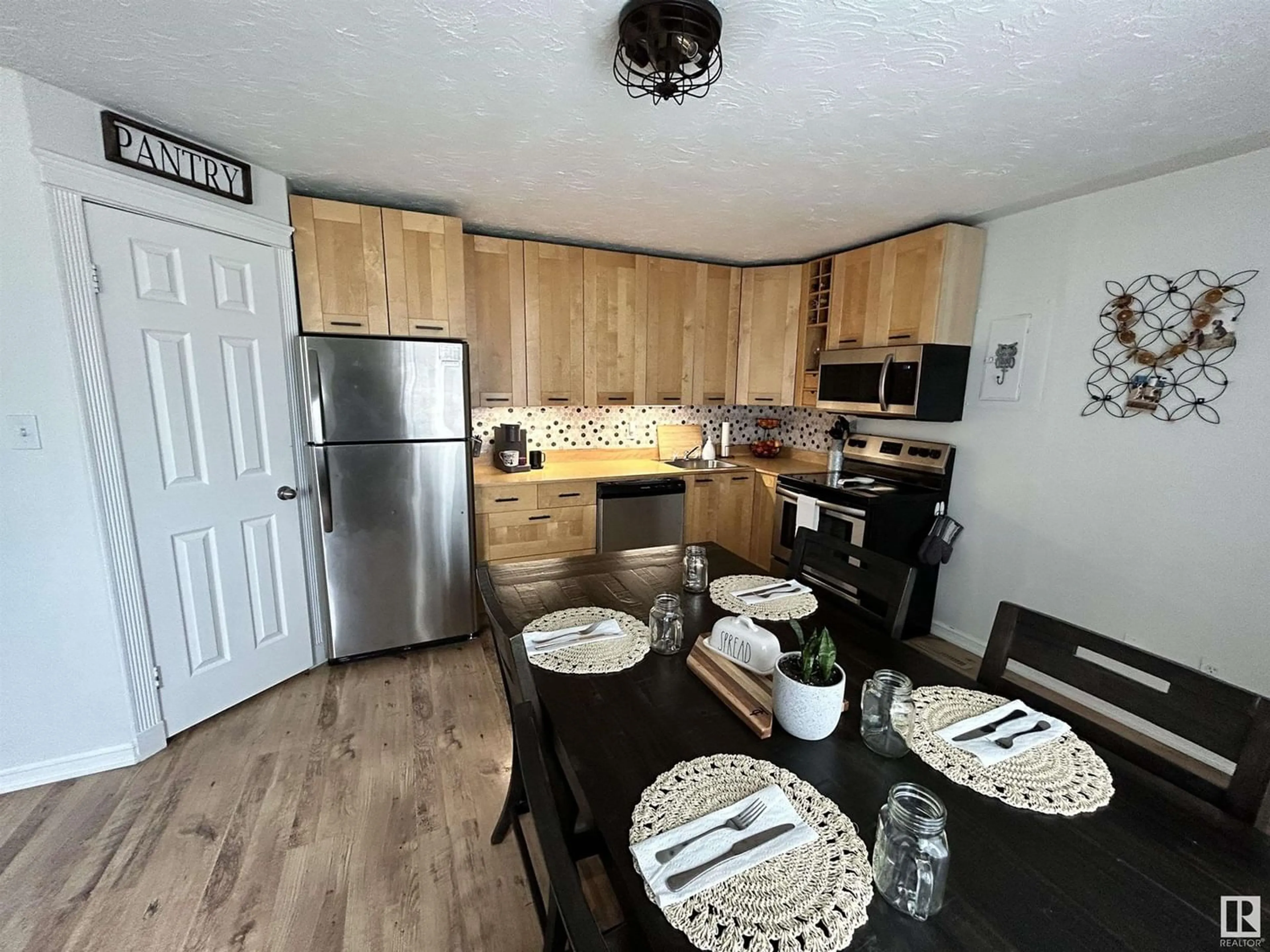 Open concept kitchen for 9735 107 ST, Westlock Alberta T7P1R8