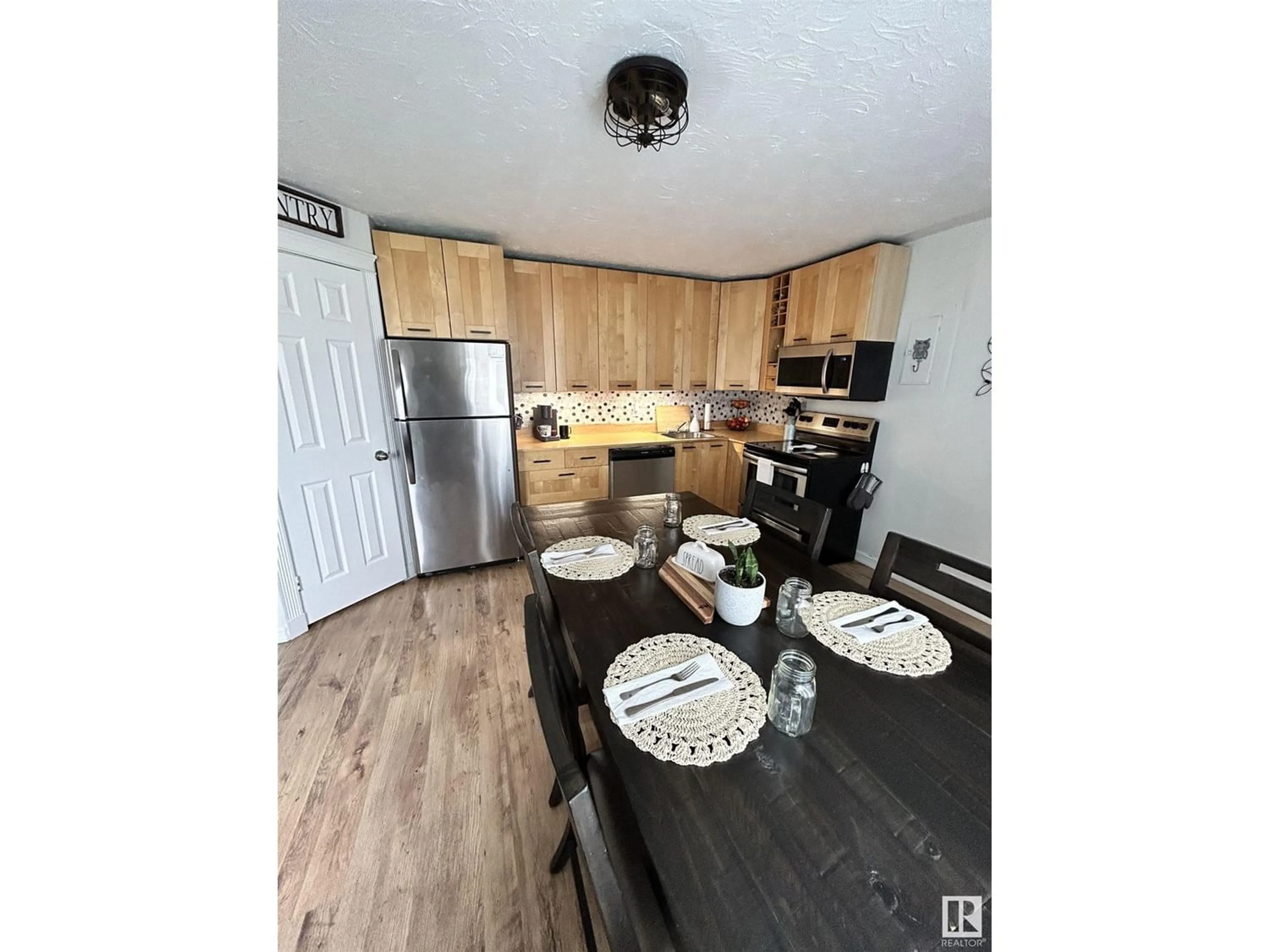 Open concept kitchen for 9735 107 ST, Westlock Alberta T7P1R8