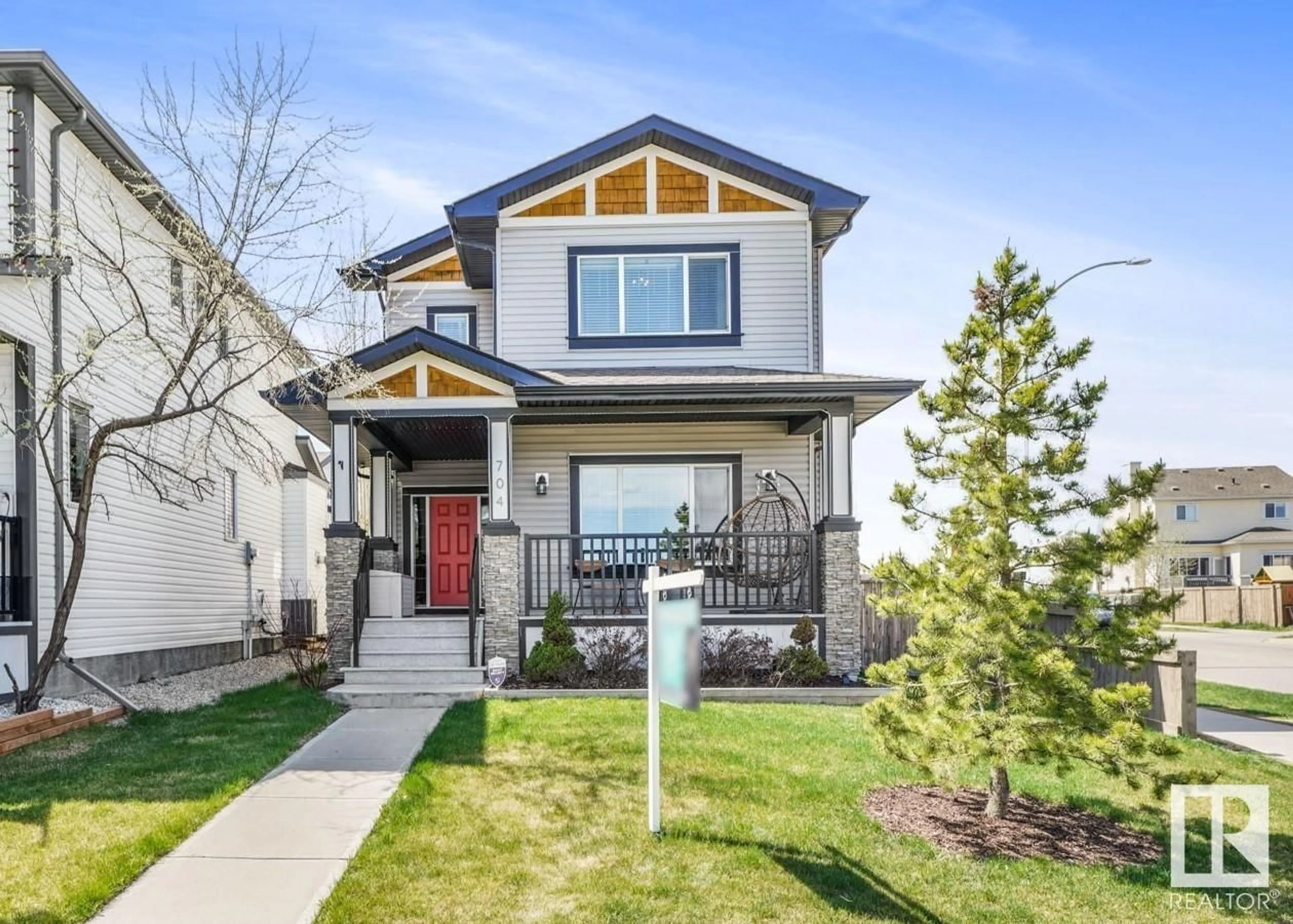 Frontside or backside of a home for 704 SECORD BV NW, Edmonton Alberta T5T7A8