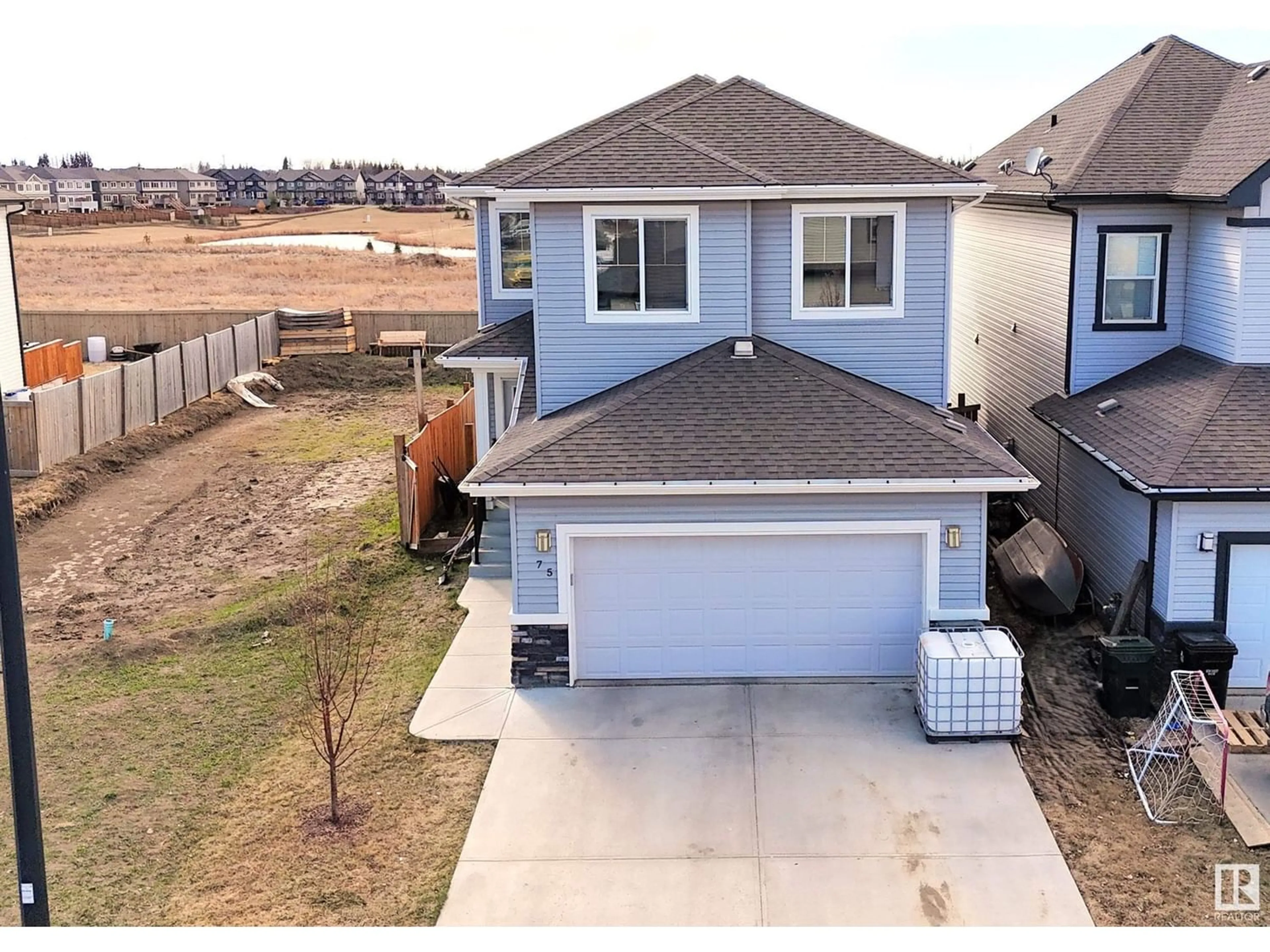Frontside or backside of a home for 75 SPRING GA, Spruce Grove Alberta T7X0V1