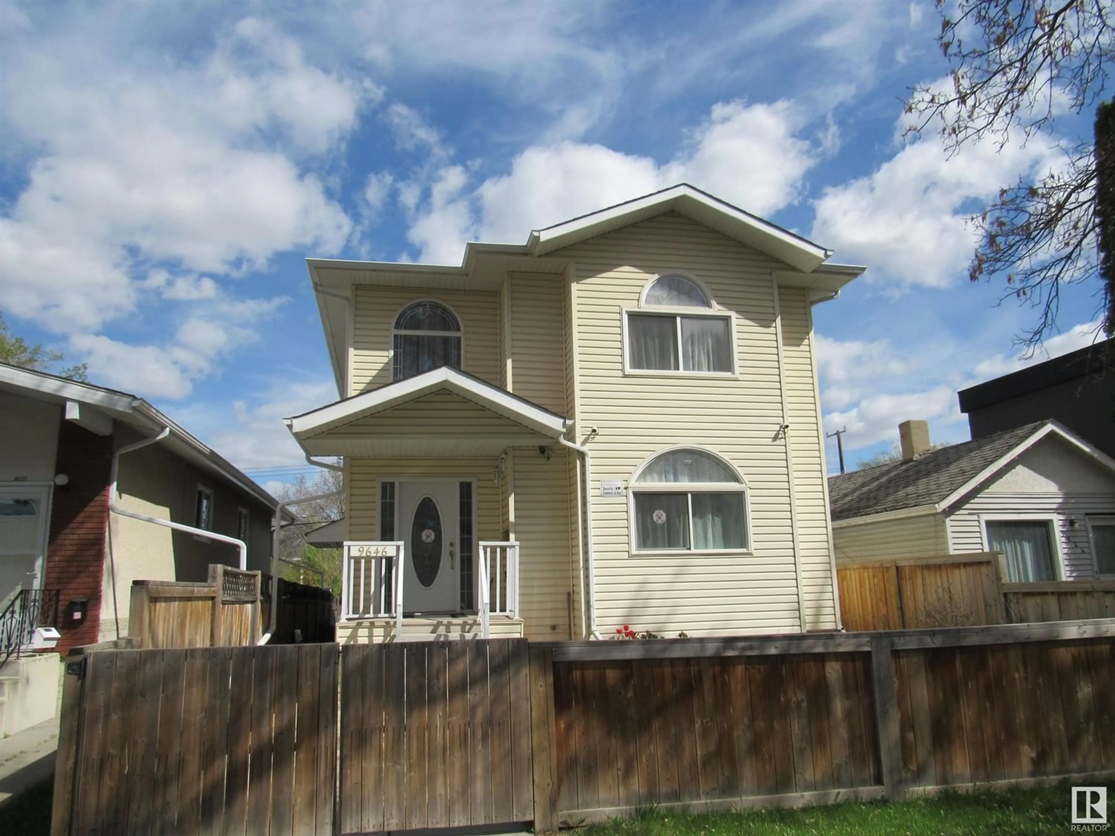 Frontside or backside of a home for 9646 73 AV NW, Edmonton Alberta T6E1B2