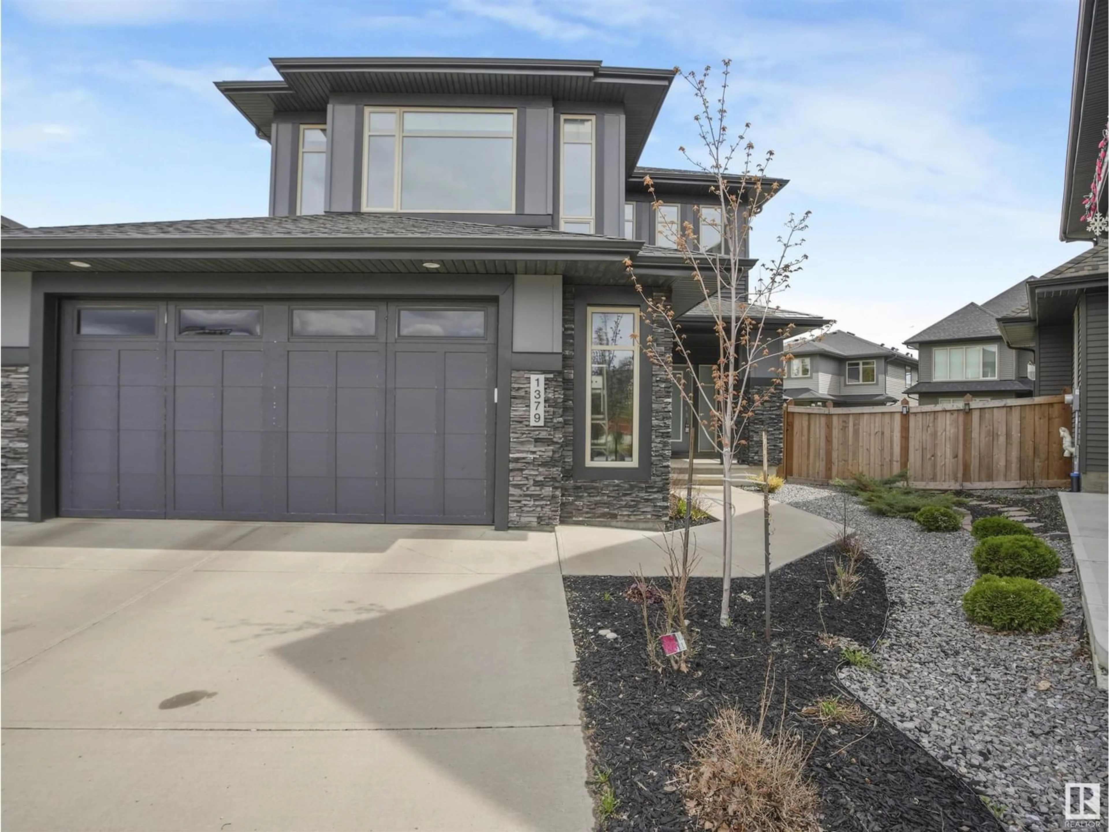 Frontside or backside of a home for 1379 AINSLIE WD SW, Edmonton Alberta T6W3E9
