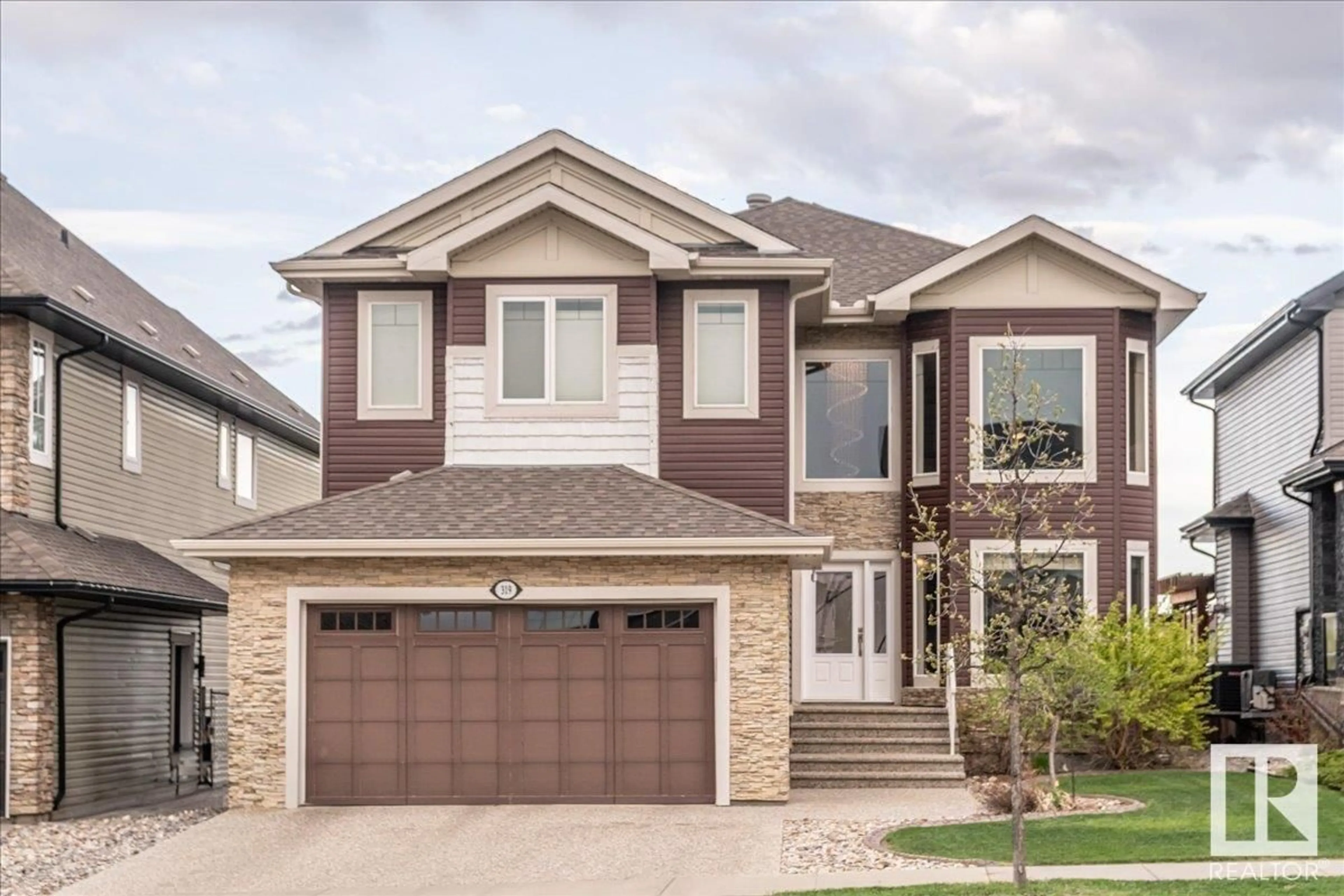 Frontside or backside of a home for 319 CAMPBELL DR, Sherwood Park Alberta T8M0R8