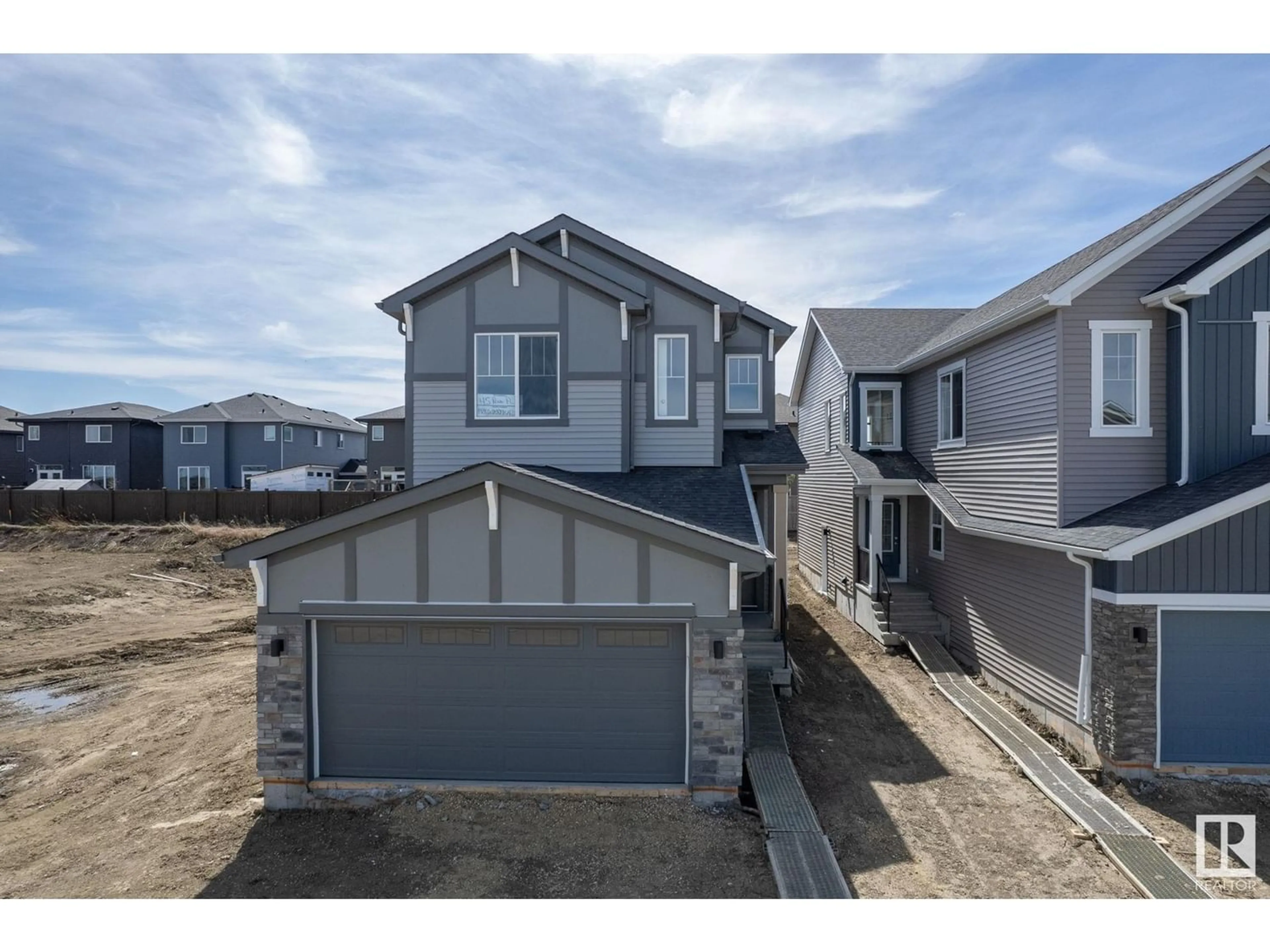 Frontside or backside of a home for 45 PENN PL, Spruce Grove Alberta T7X2W7