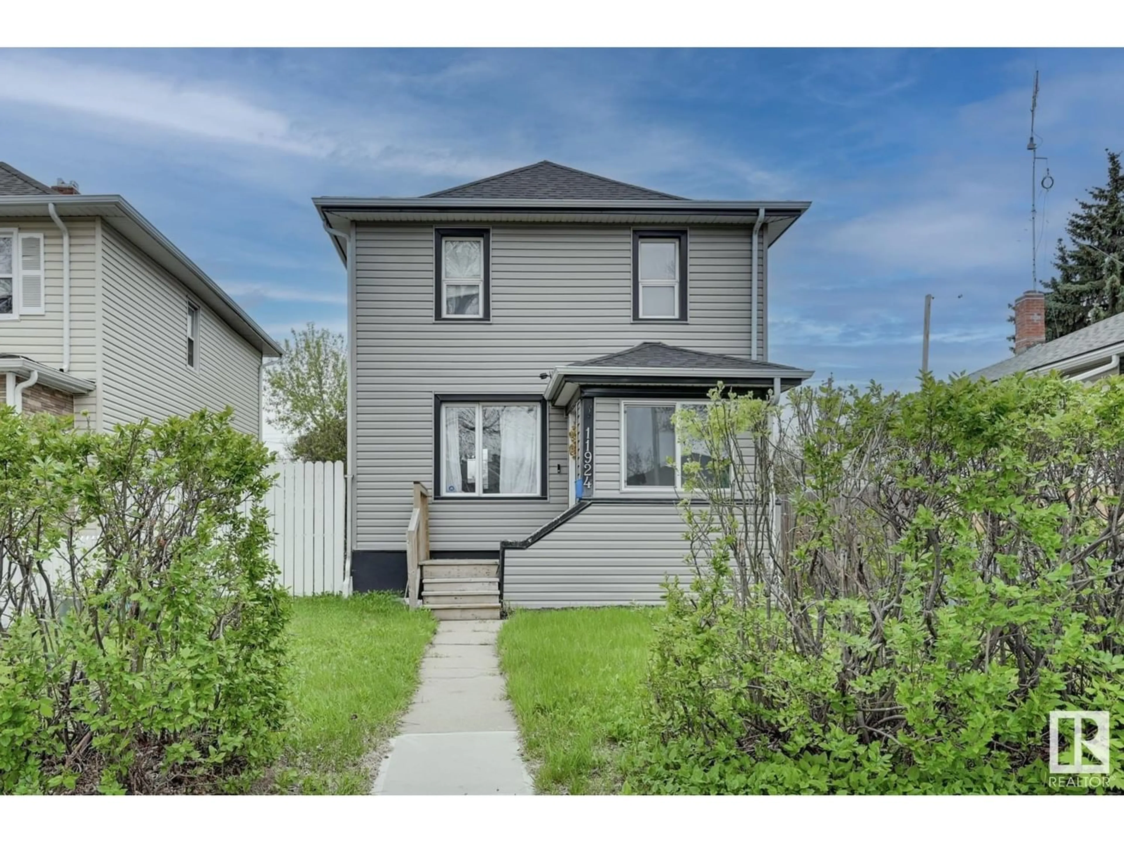 Frontside or backside of a home for 11924 89 ST NW, Edmonton Alberta T5B3V8