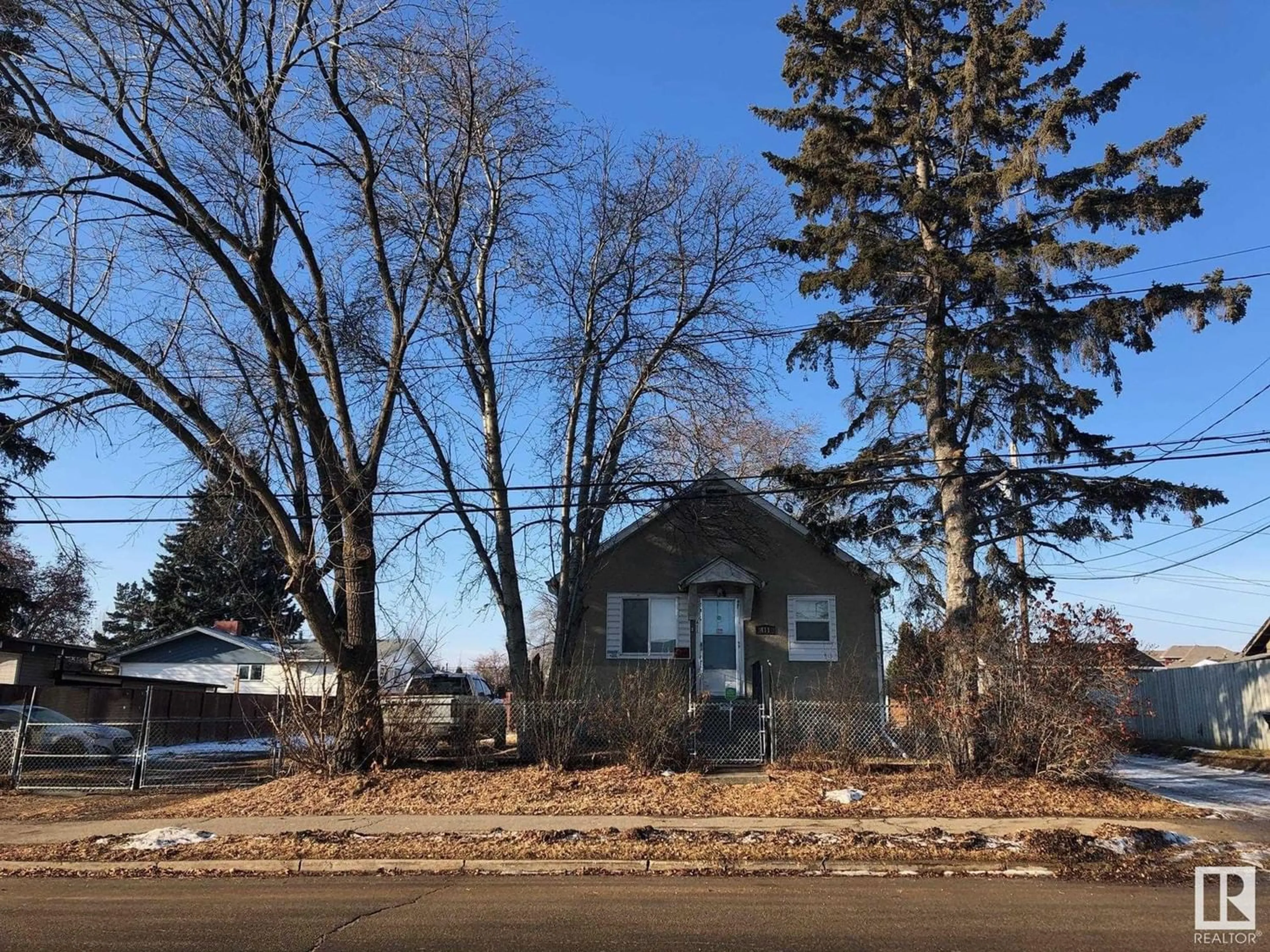 Frontside or backside of a home for 411 MAIN ST, Spruce Grove Alberta T7X3R6