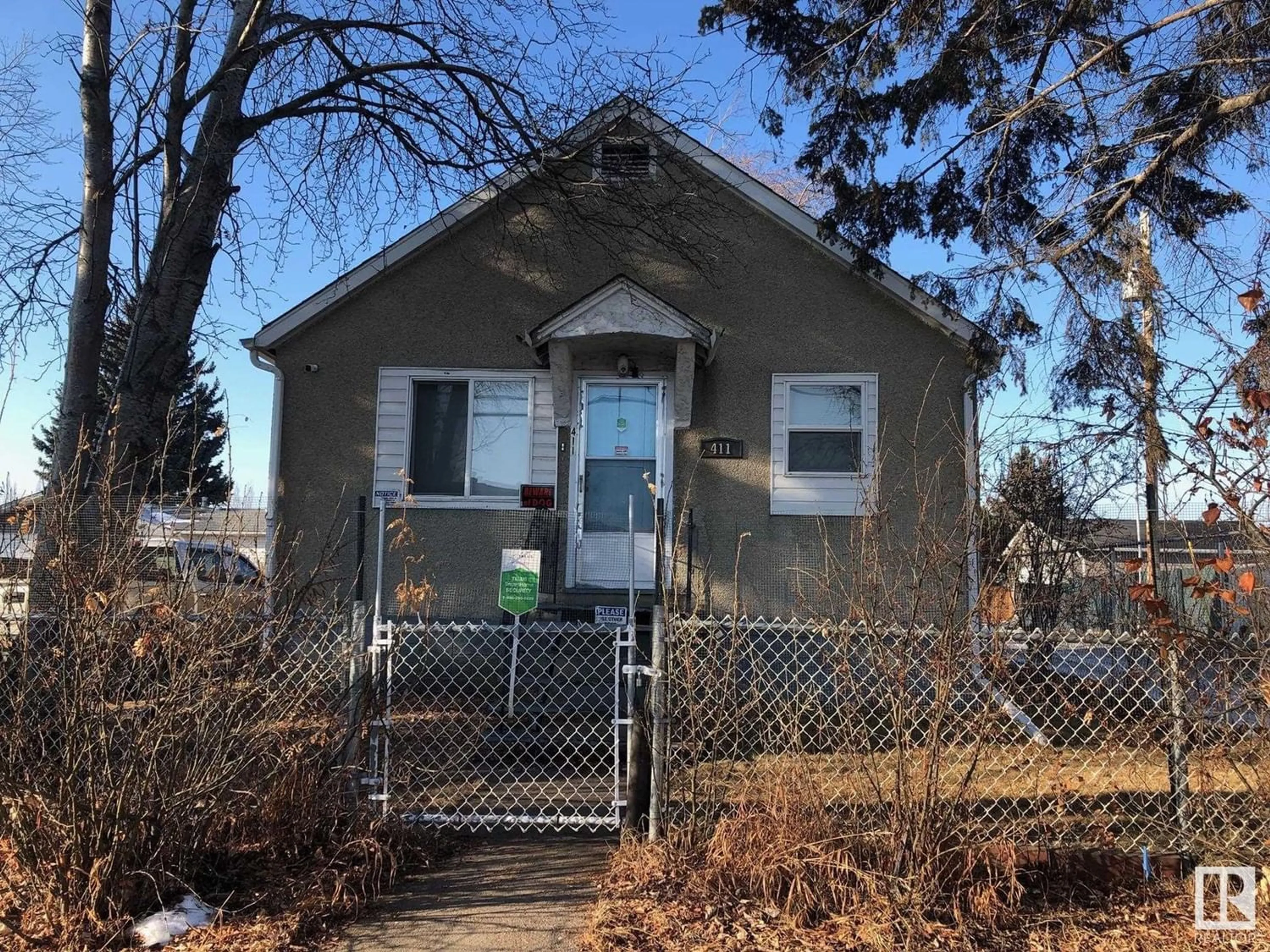 Frontside or backside of a home for 411 MAIN ST, Spruce Grove Alberta T7X3R6