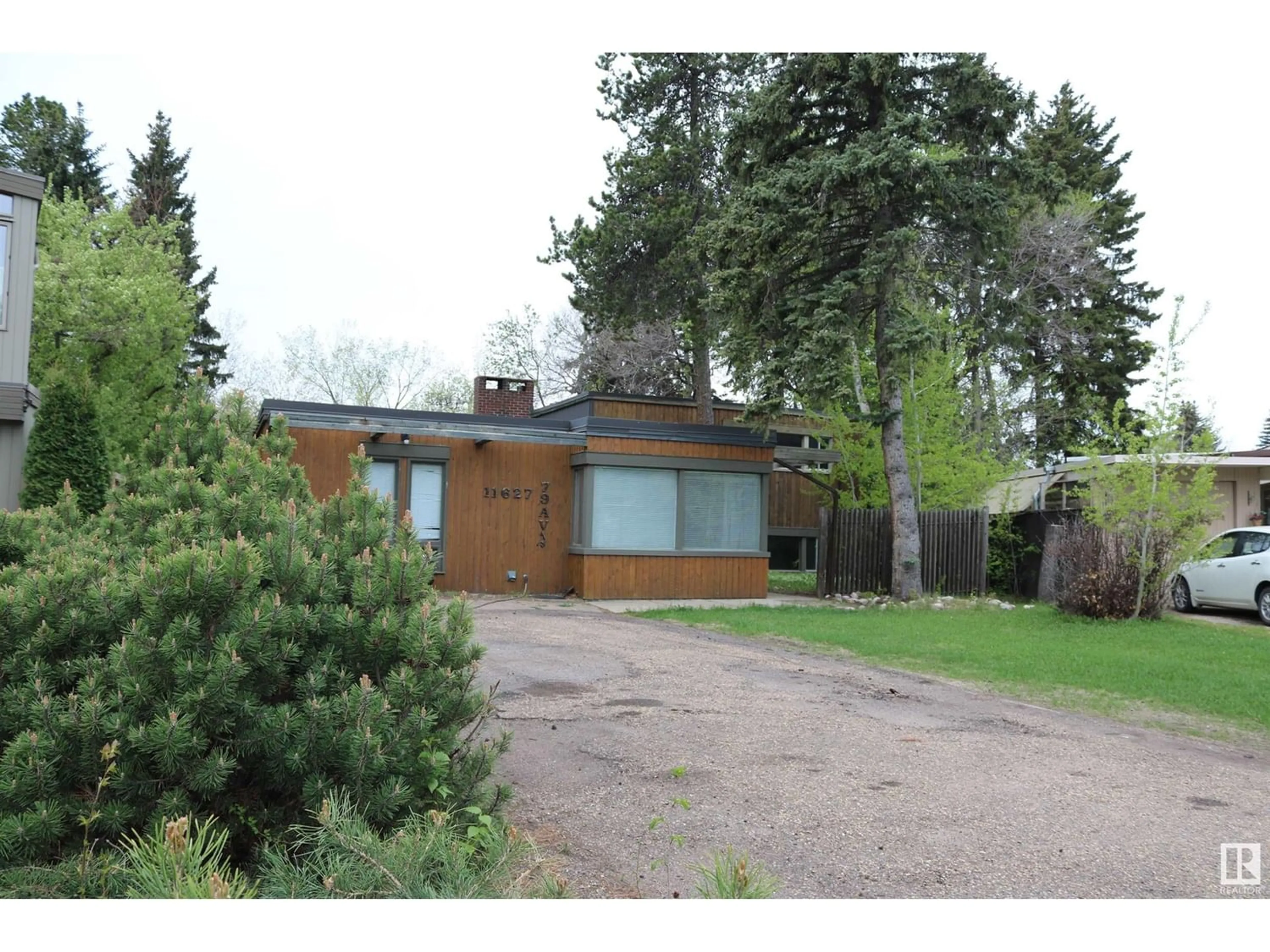 Frontside or backside of a home for 11627 79 AV NW, Edmonton Alberta T6G0P8