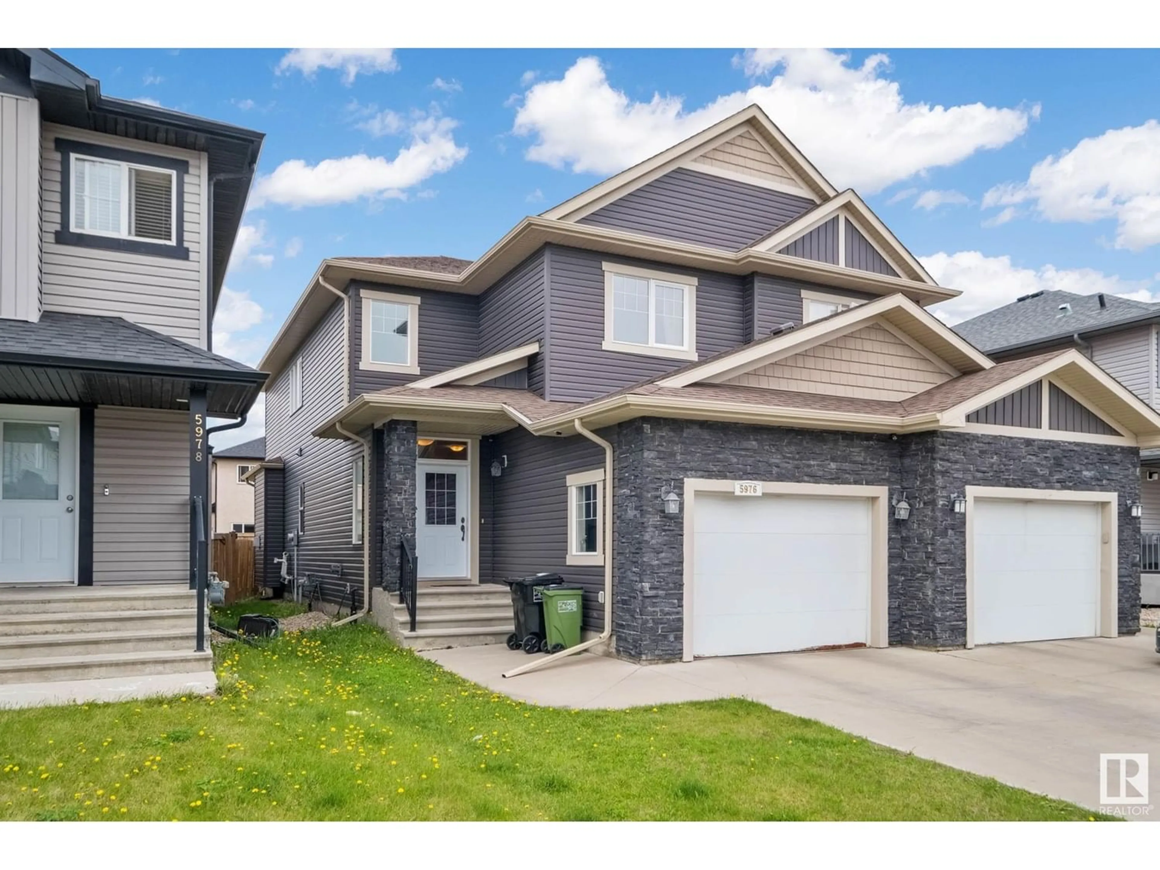 Frontside or backside of a home for 5976 167C AV NW, Edmonton Alberta T5Y0W5