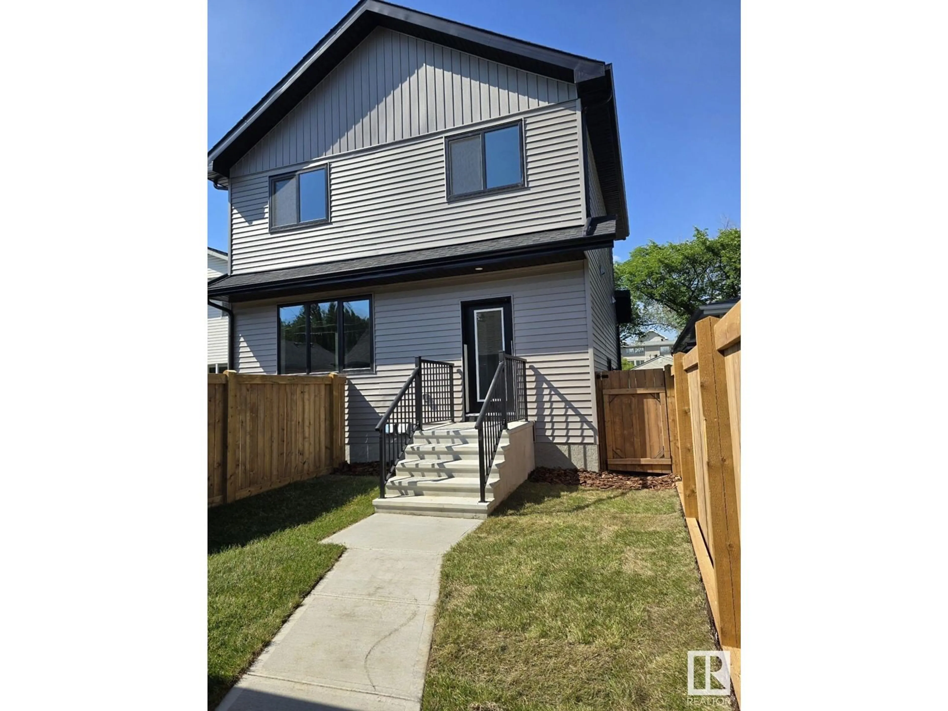 Frontside or backside of a home for 8727 81 AV NW, Edmonton Alberta T6C0W5