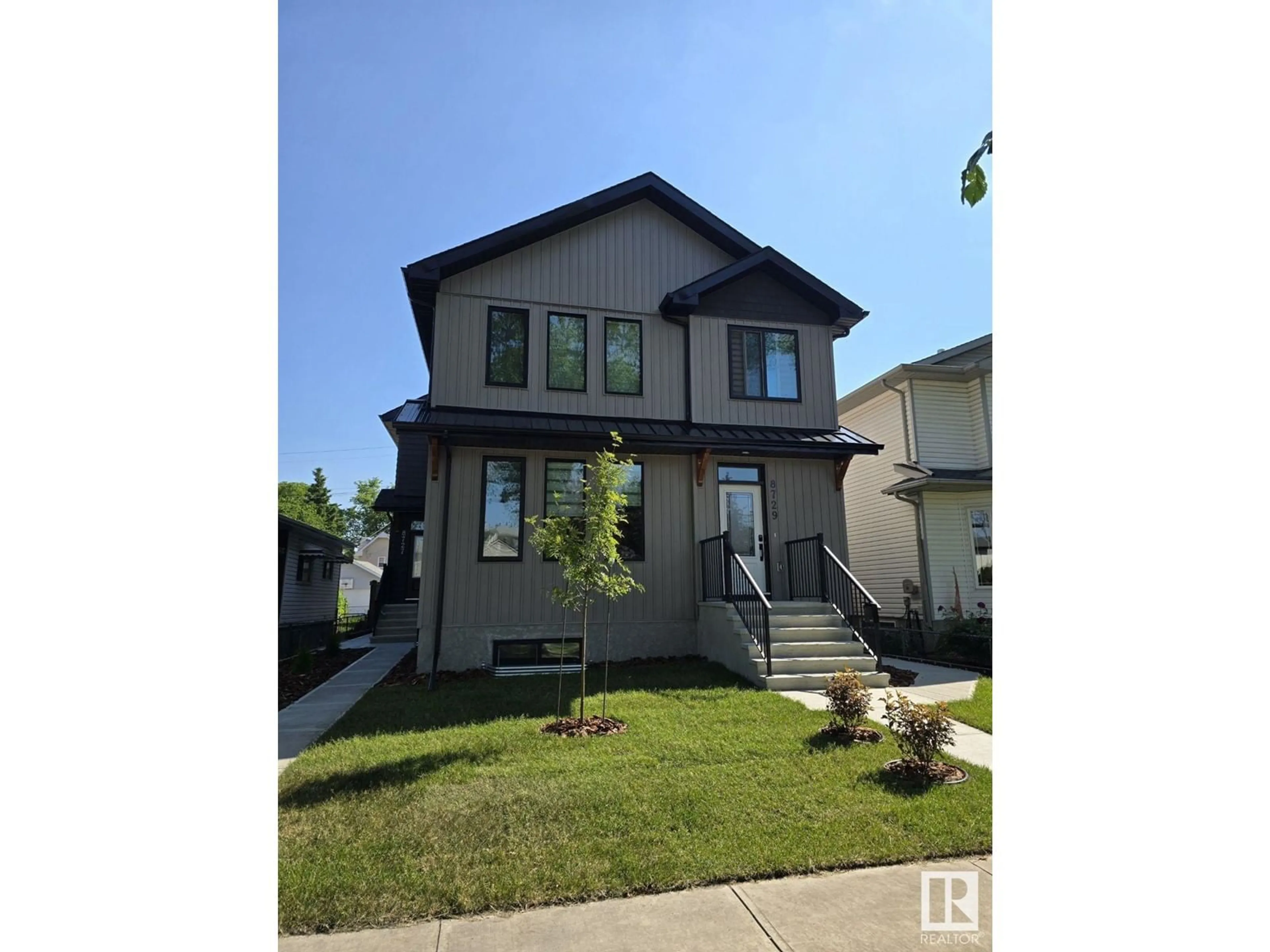 Frontside or backside of a home for 8727 81 AV NW, Edmonton Alberta T6C0W5