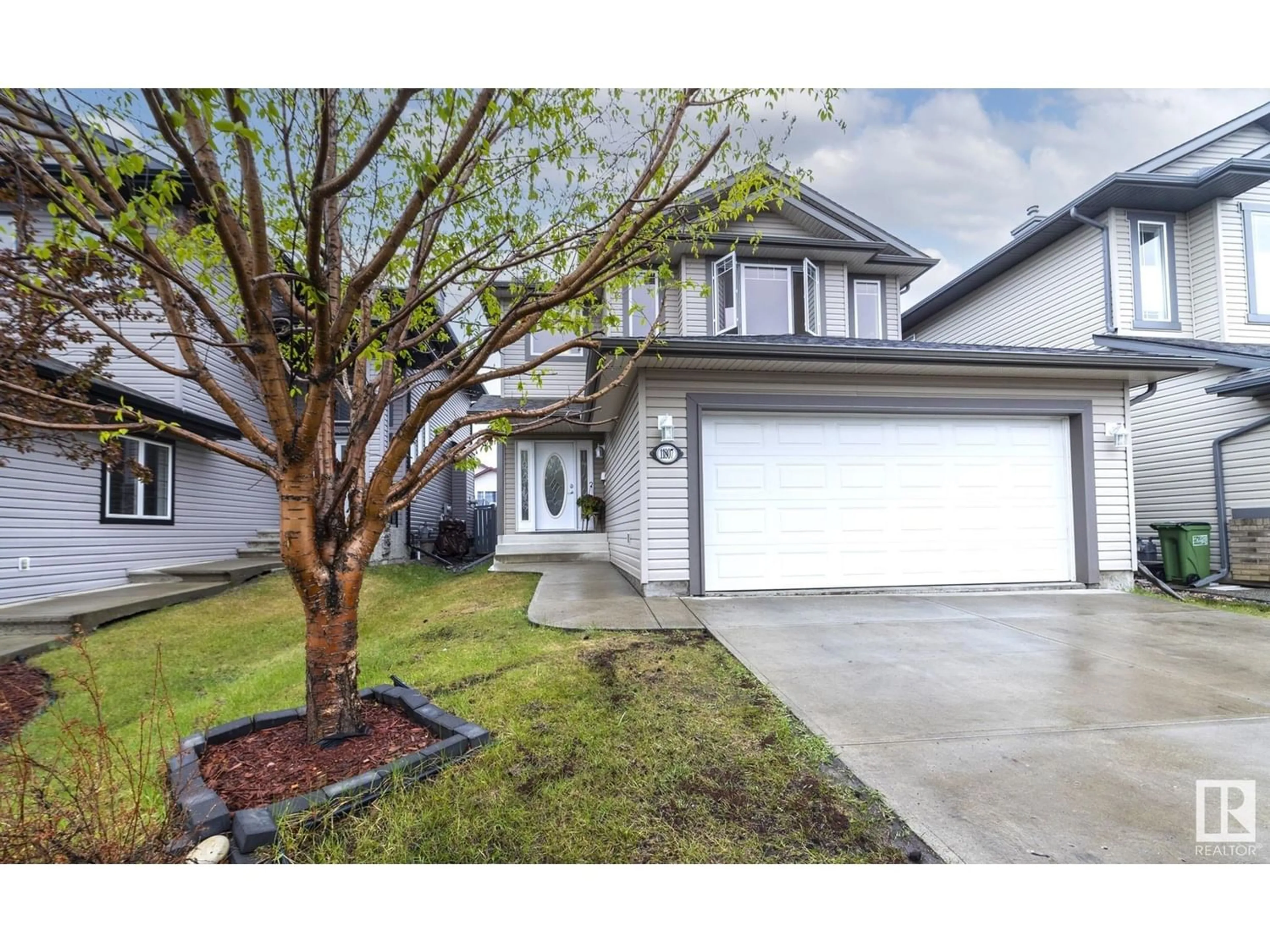 Frontside or backside of a home for 11807 174 AV NW, Edmonton Alberta T5X0A6