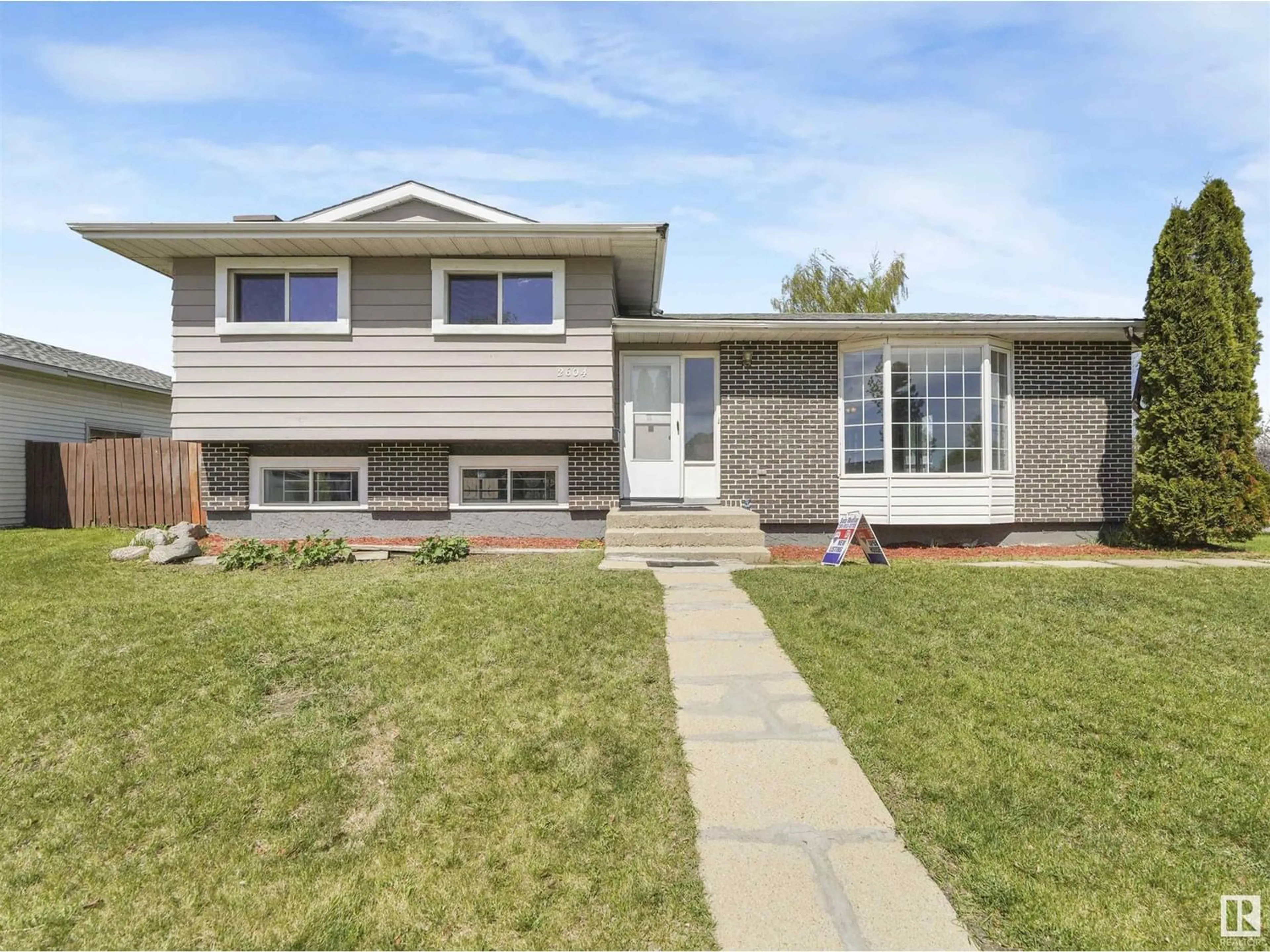 Frontside or backside of a home for 2604 136 AV NW, Edmonton Alberta T5A3W4