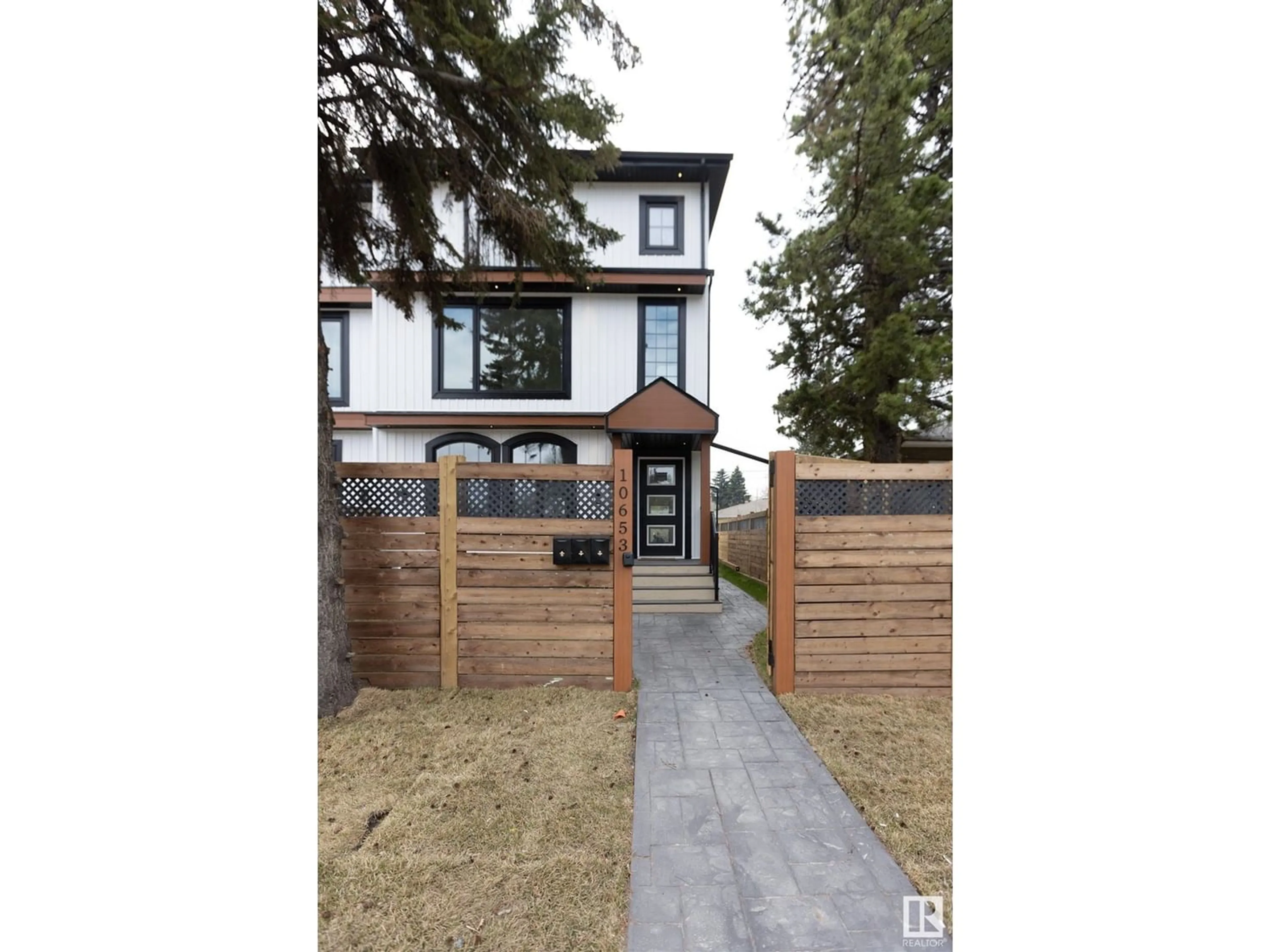 Frontside or backside of a home for 10653 61 AV NW, Edmonton Alberta T6H1P7