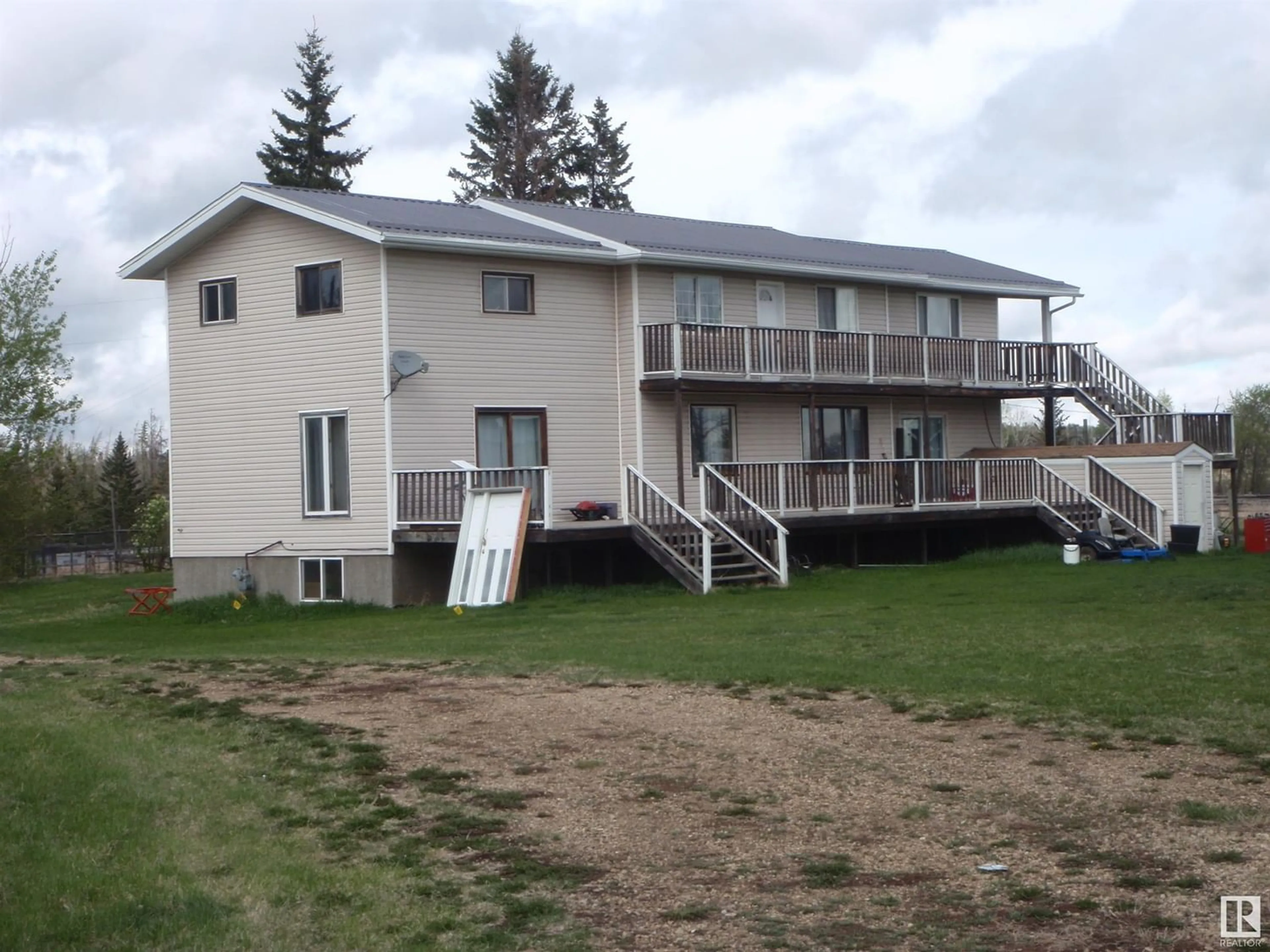 A pic from exterior of the house or condo for 60021B Range Rd 63, Rural Barrhead County Alberta T0G2G0