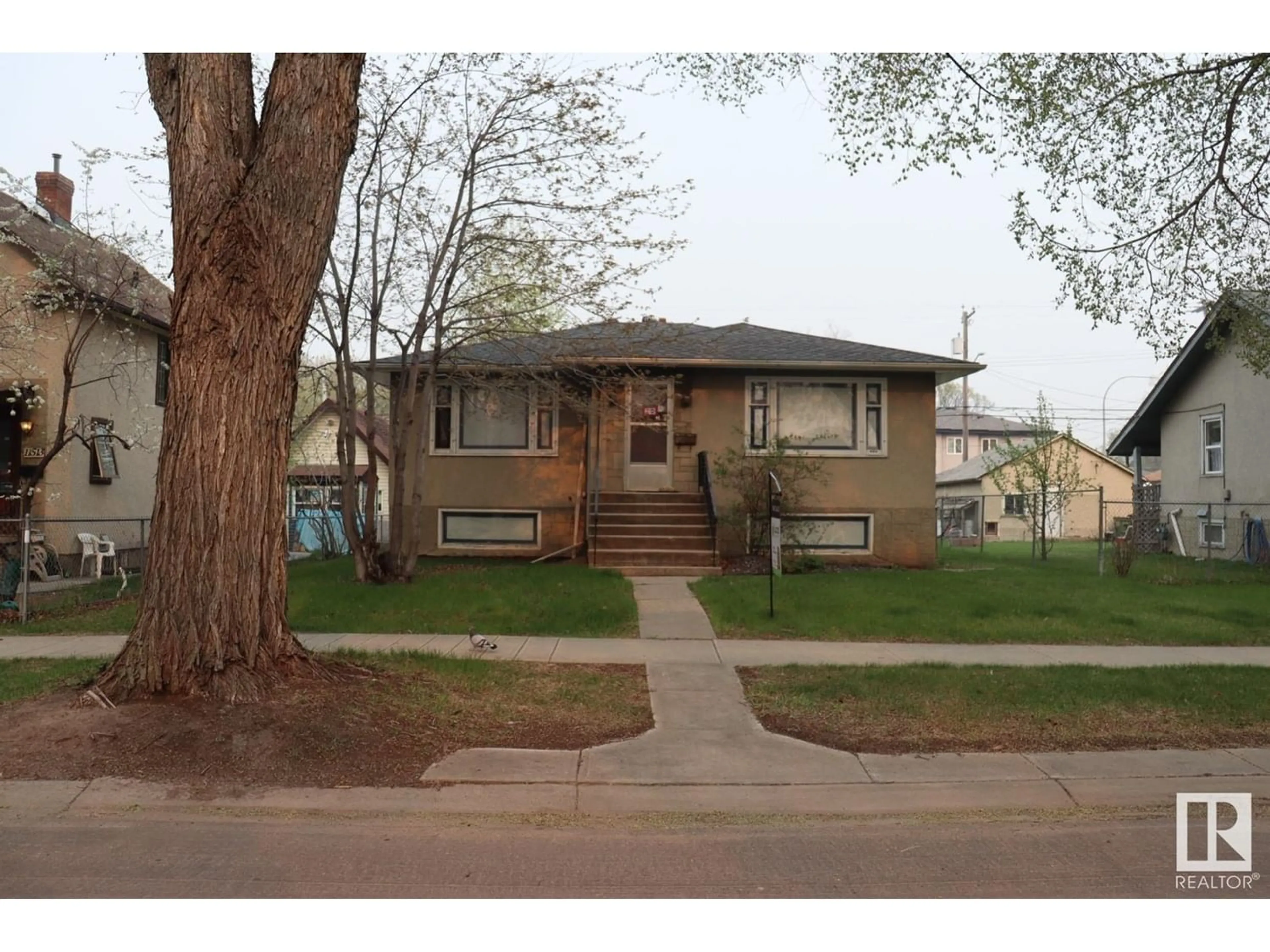 Frontside or backside of a home for 11509 84 ST NW, Edmonton Alberta T5B3B6