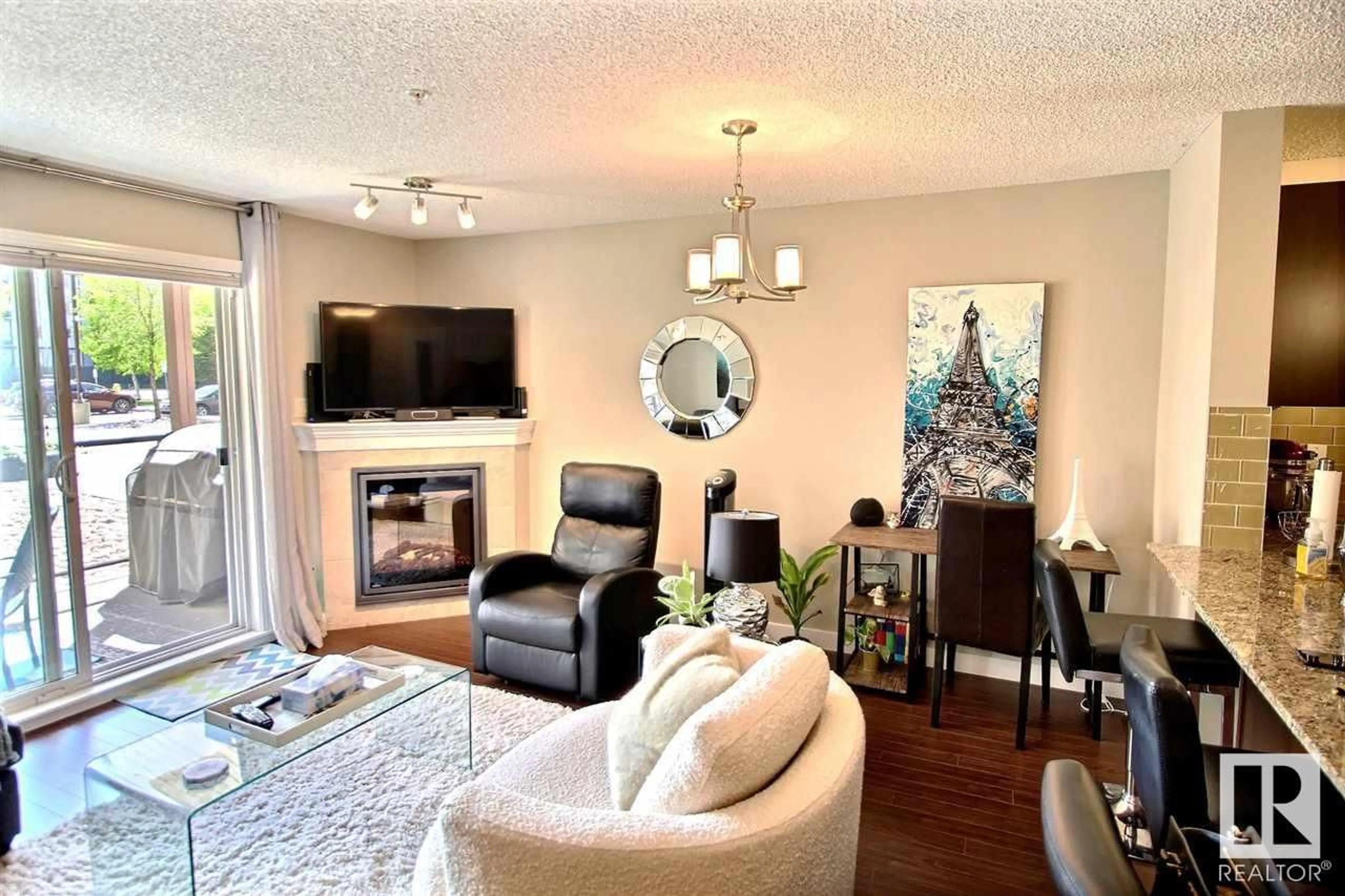 Living room for #106 2045 Grantham CO NW, Edmonton Alberta T5T3X6