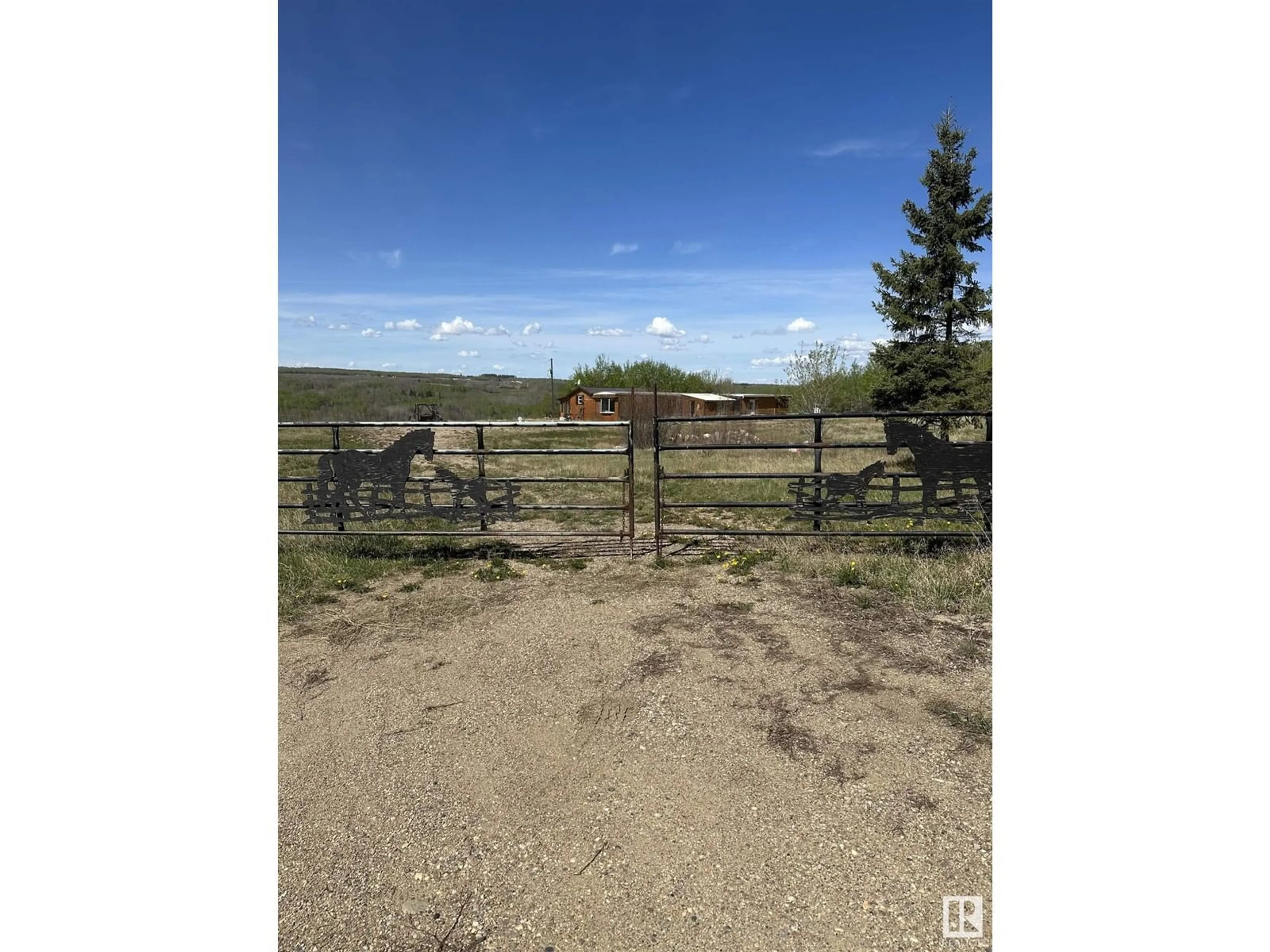 A pic from outside/outdoor area/front of a property/back of a property/a pic from drone, mountain view for 55323 RR 43, Rural St. Paul County Alberta T0A1X0