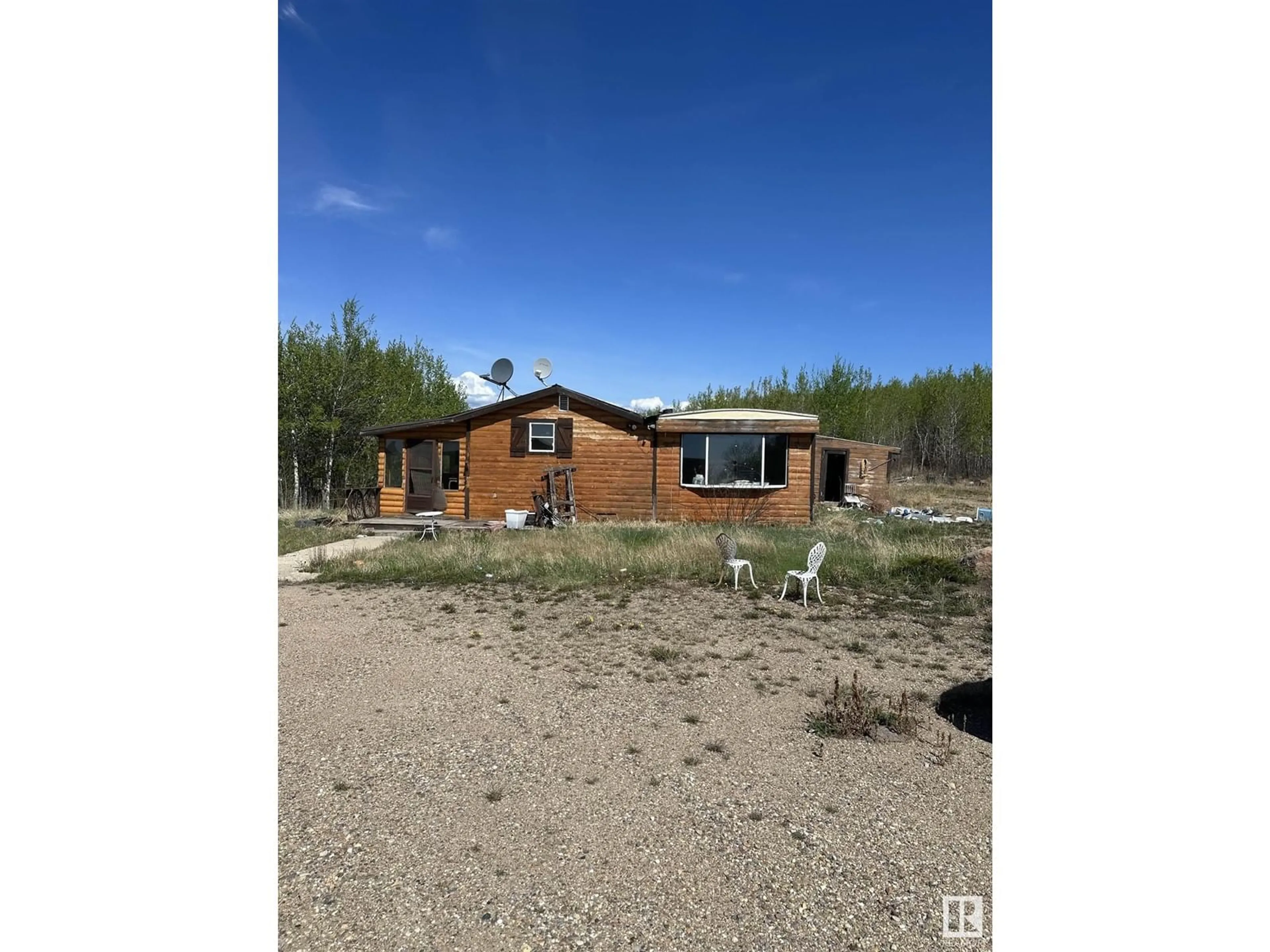 A pic from outside/outdoor area/front of a property/back of a property/a pic from drone, building for 55323 RR 43, Rural St. Paul County Alberta T0A1X0