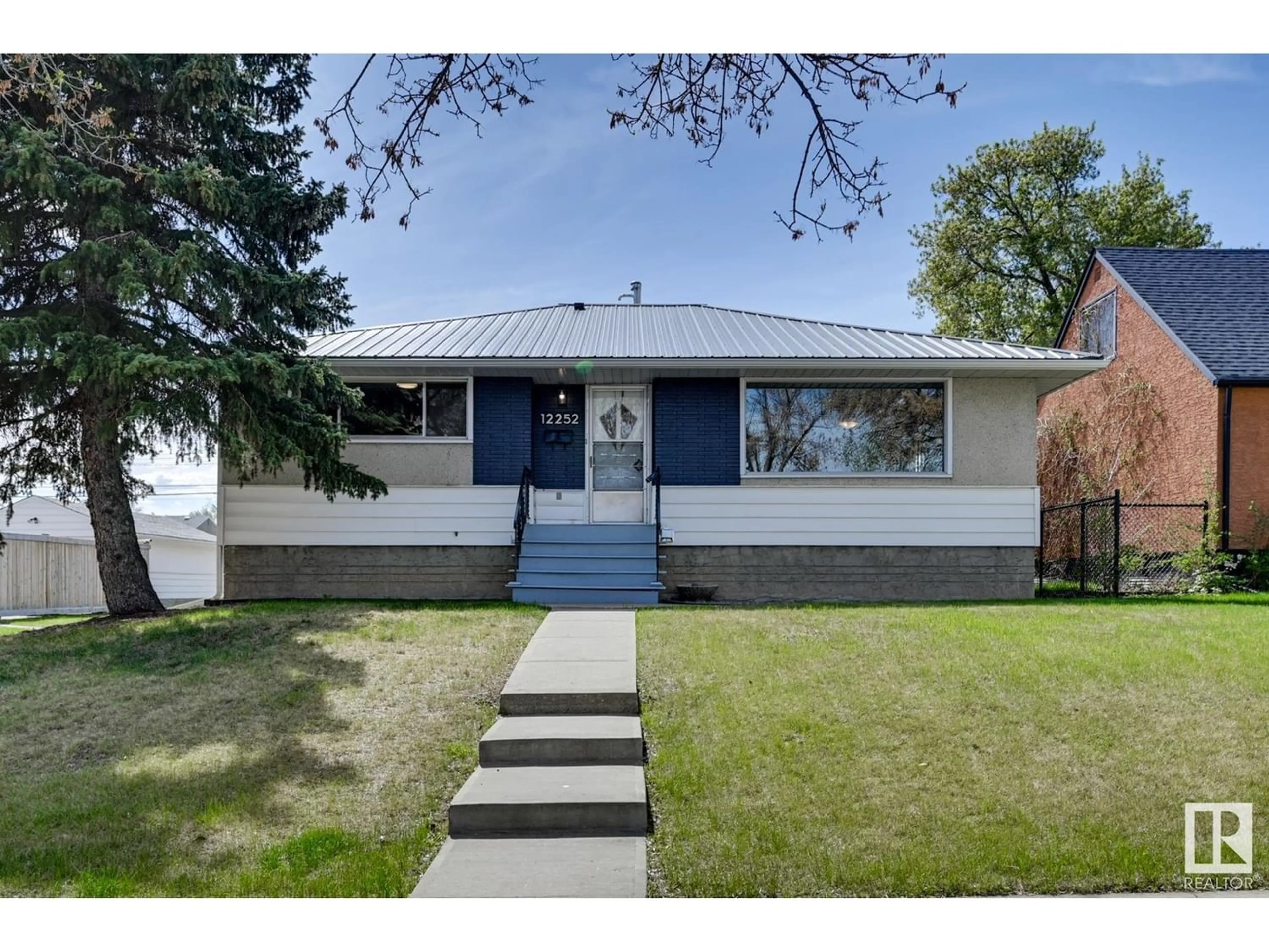 Frontside or backside of a home for 12252 132 ST NW, Edmonton Alberta T5L1P6