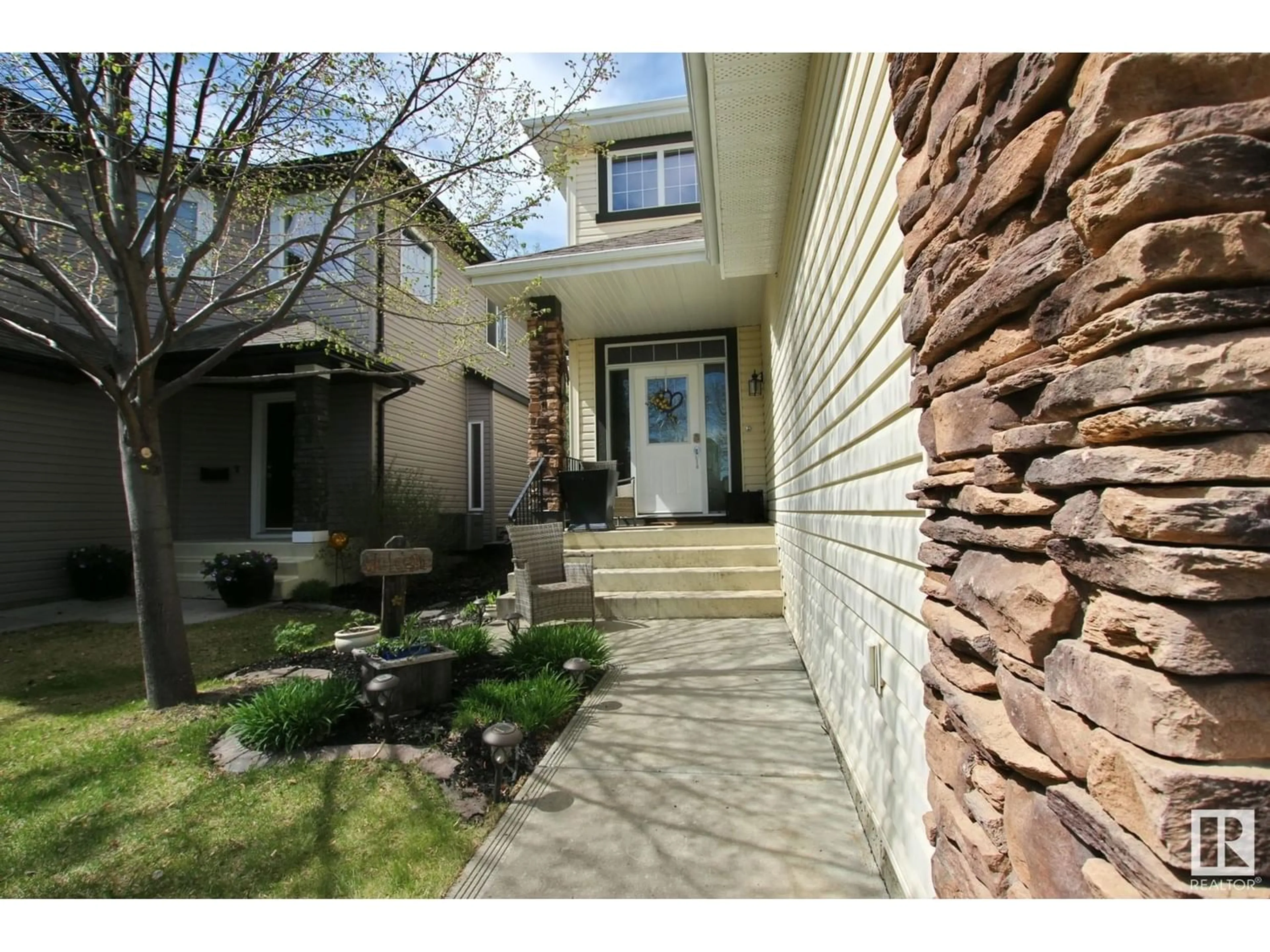 Frontside or backside of a home for 12320 20 AV SW, Edmonton Alberta T6W1Y1