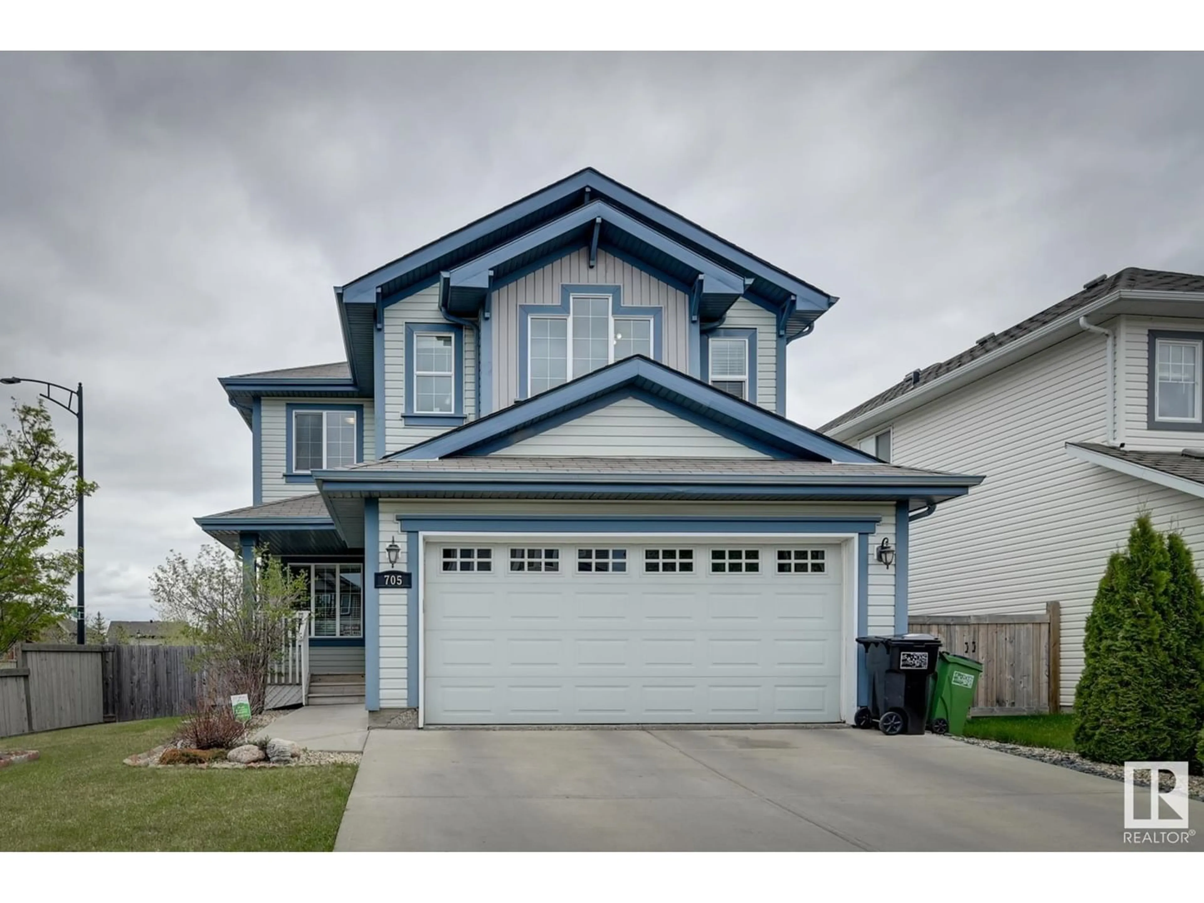 Frontside or backside of a home for 705 173B ST SW, Edmonton Alberta T6M0M3