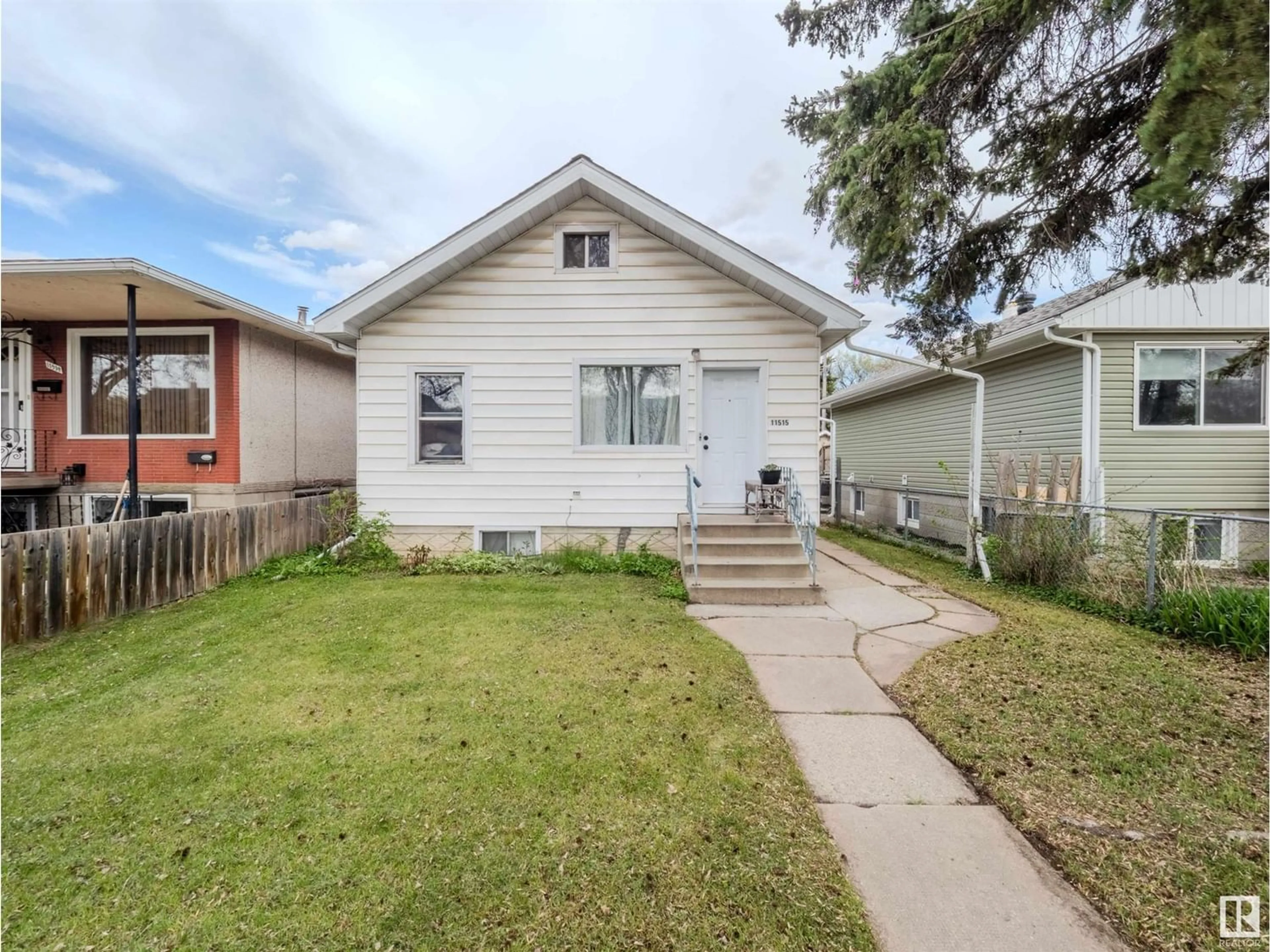 Frontside or backside of a home for 11515 89 ST NW, Edmonton Alberta T5B3V1
