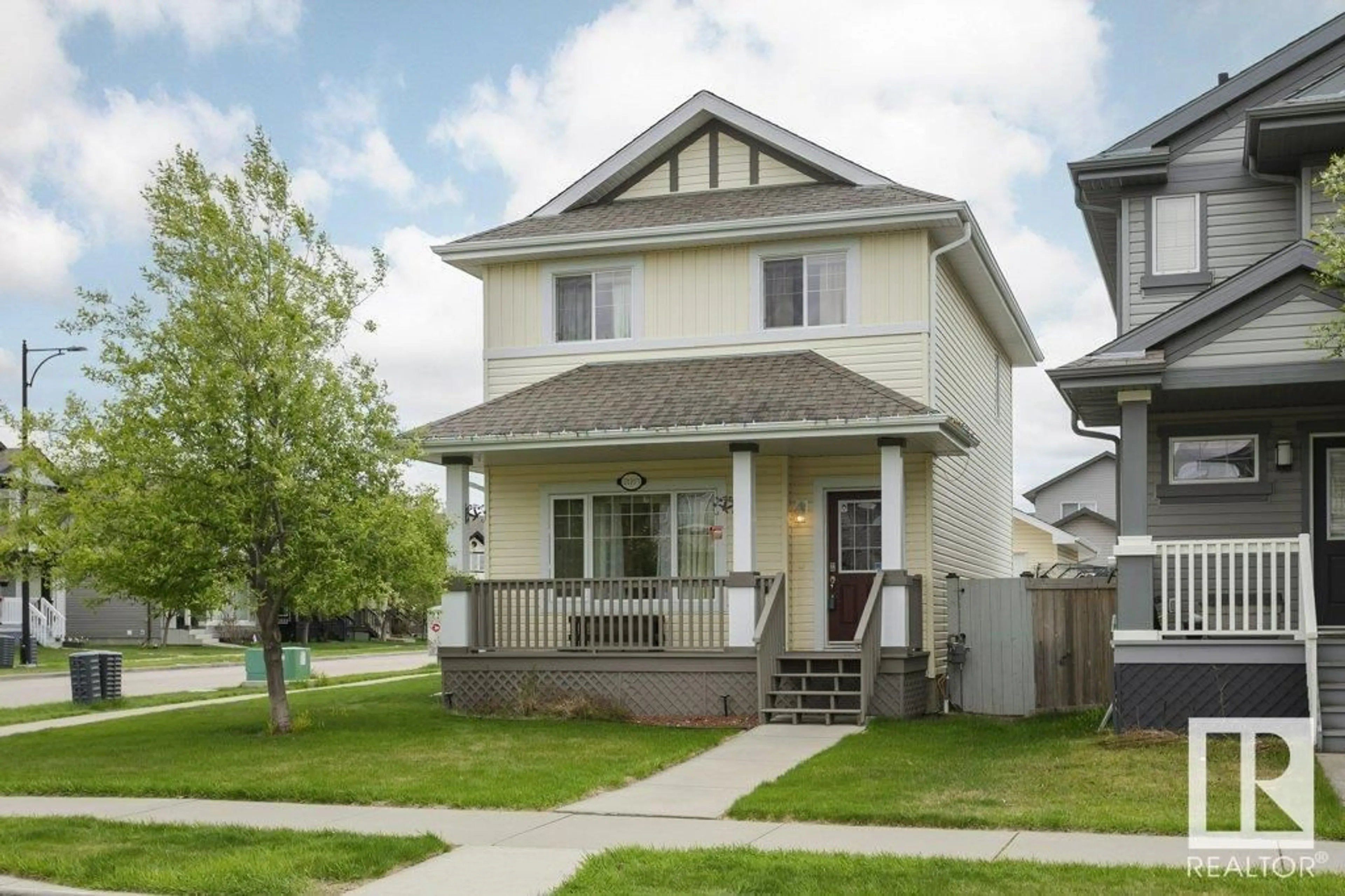 Frontside or backside of a home for 21103 59 AV NW, Edmonton Alberta T6M0H2